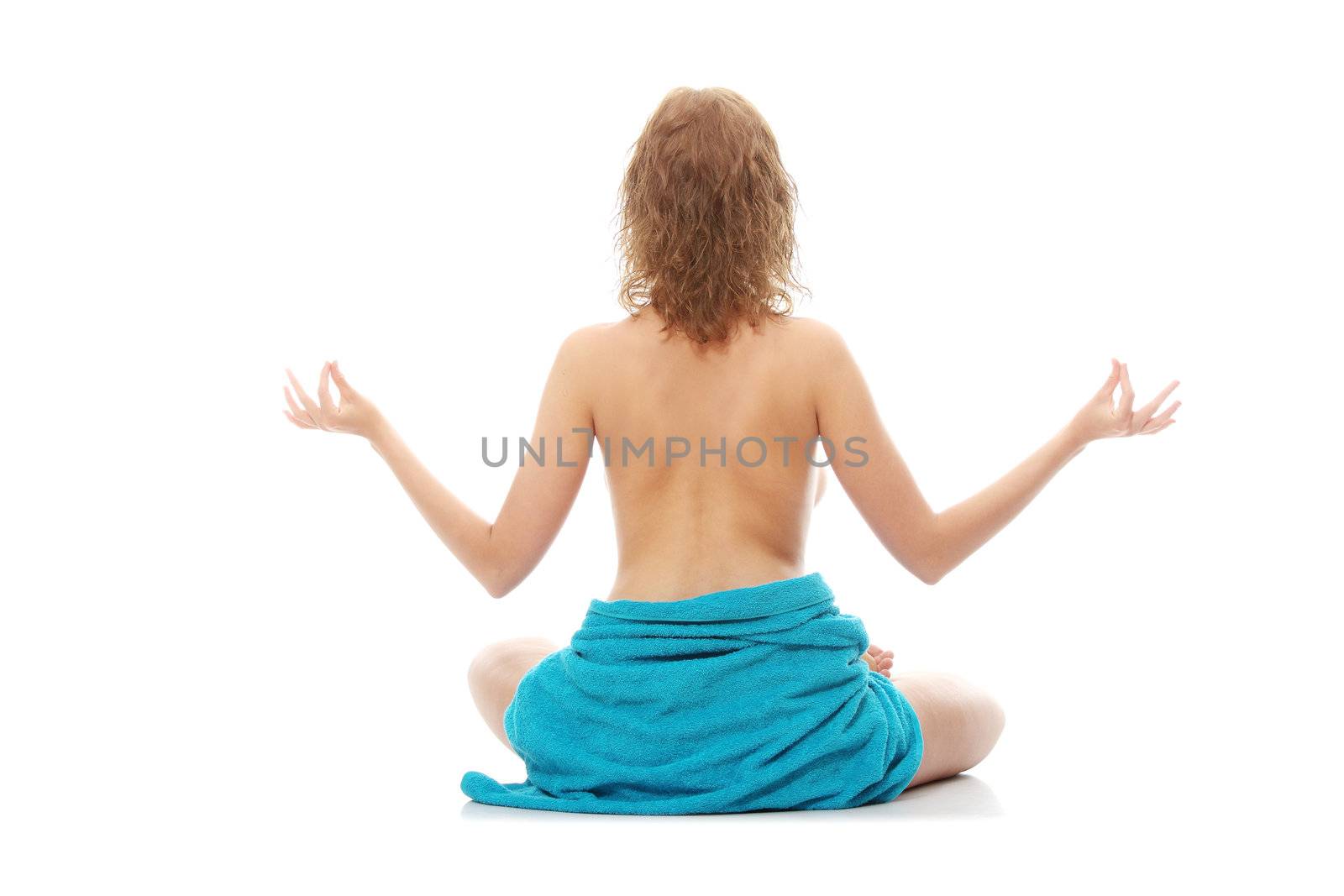 Woman in yoga position by BDS