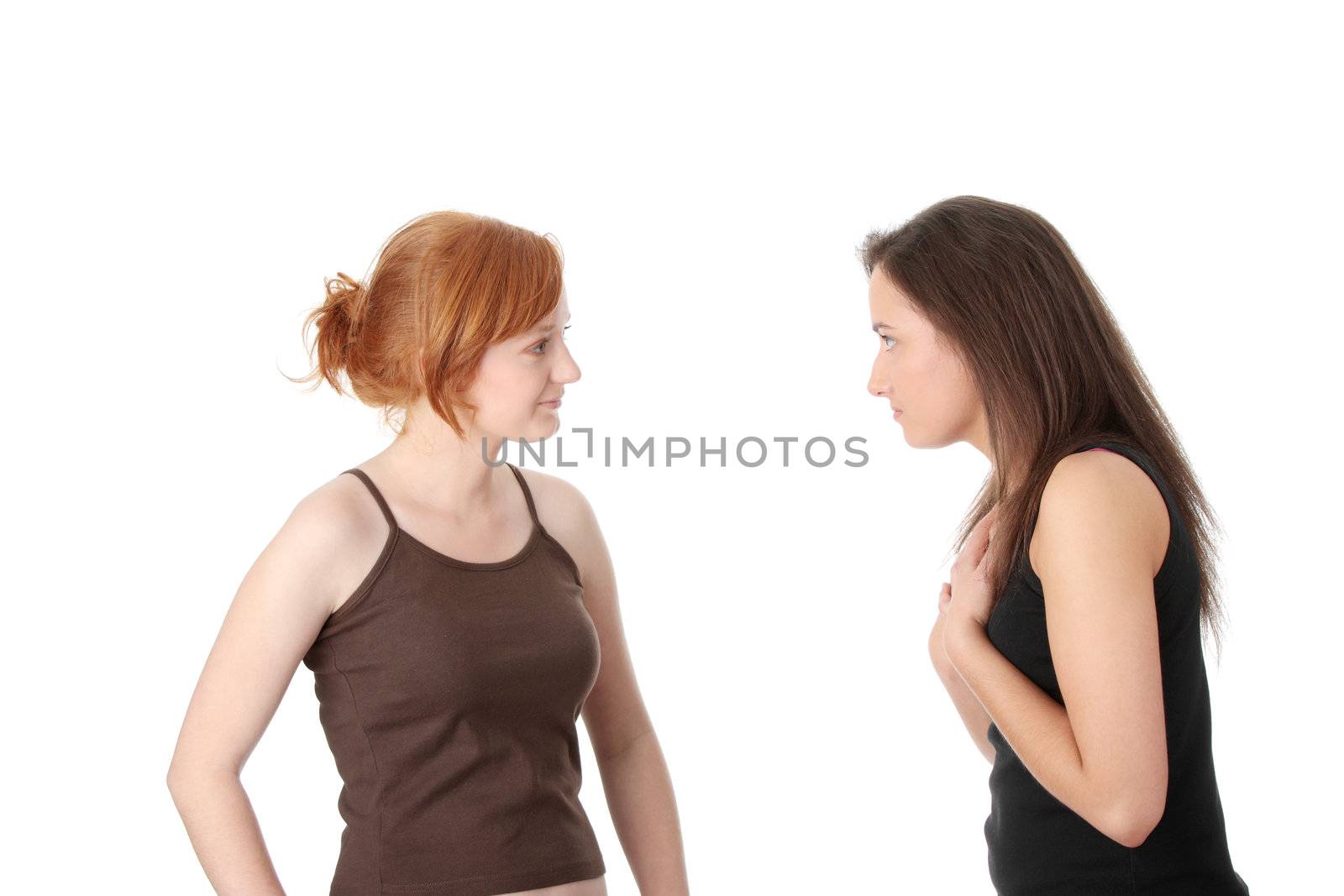 Two young womans talking isolated on white background