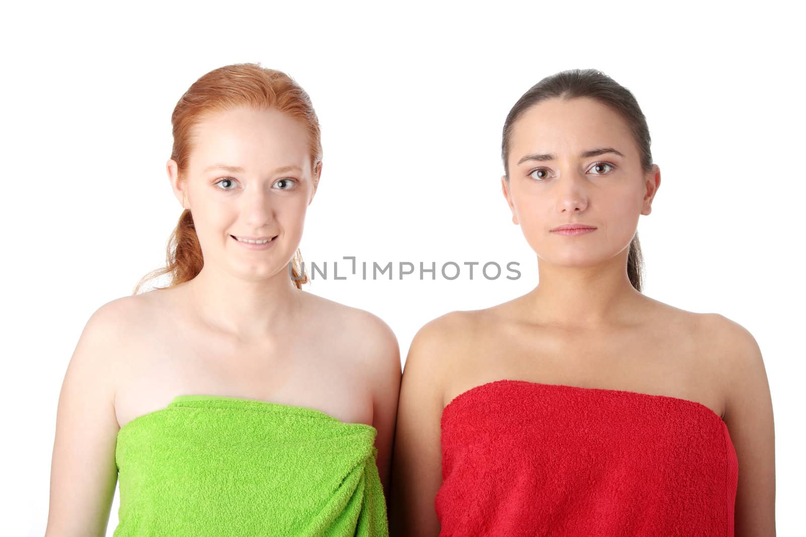 Spa - portrait of two woman - redhead and brunette - isolated on white background
