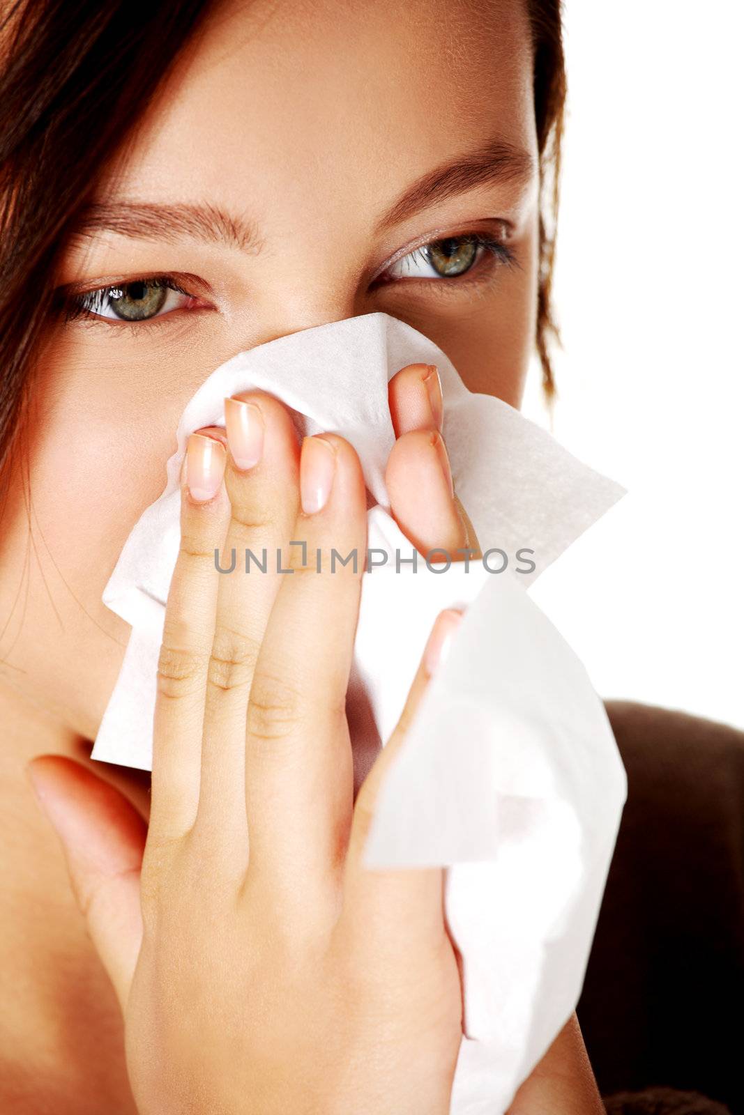 Closeup portrait of young caucasian blowing girl over white background.