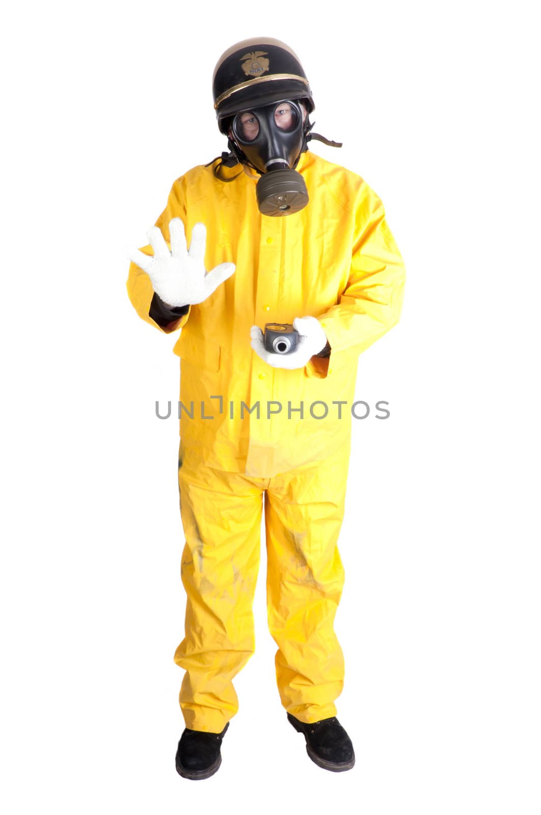 Policeman in Hazmat clothing with gieger counter isolated over white background