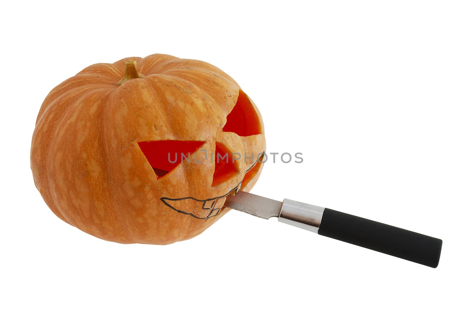Halloween jack o lantern  carving pumpkin with knife by vadidak