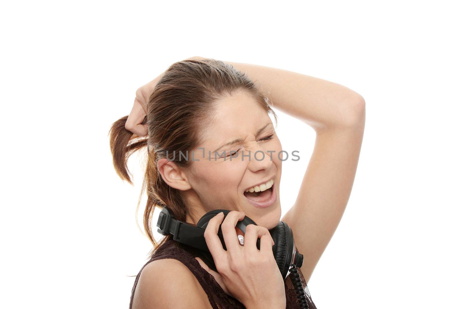 Young caucasian woman with headphones on her nack