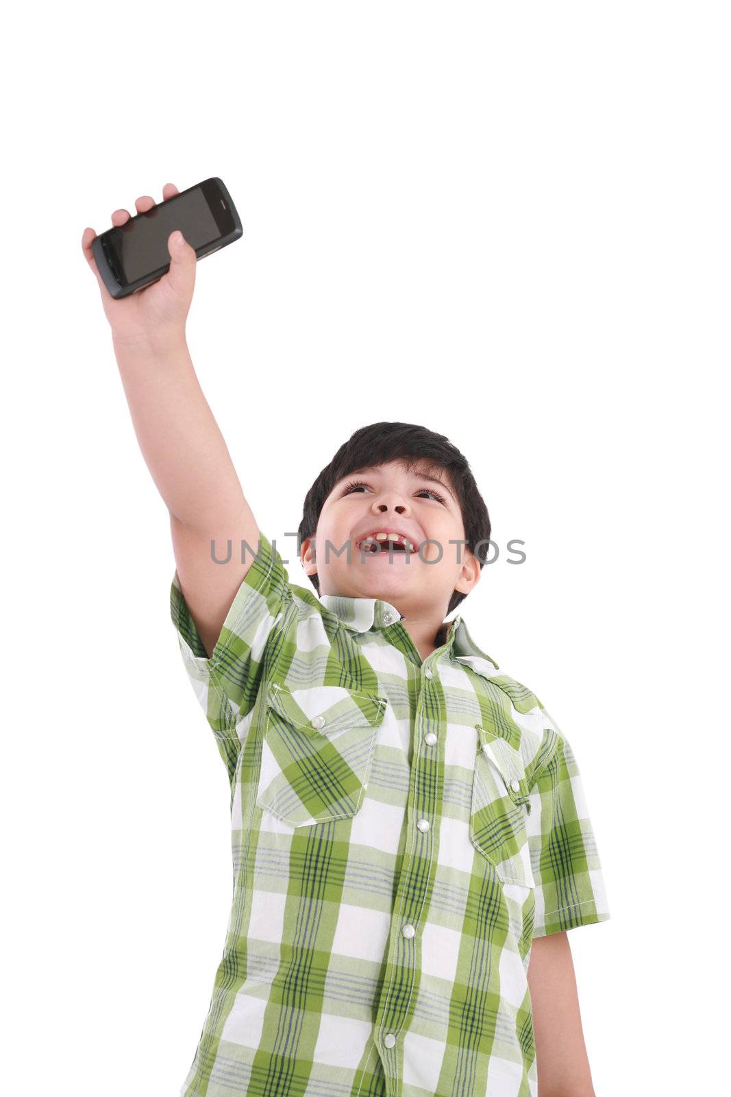boy holding up cellular phone and smiling by dacasdo