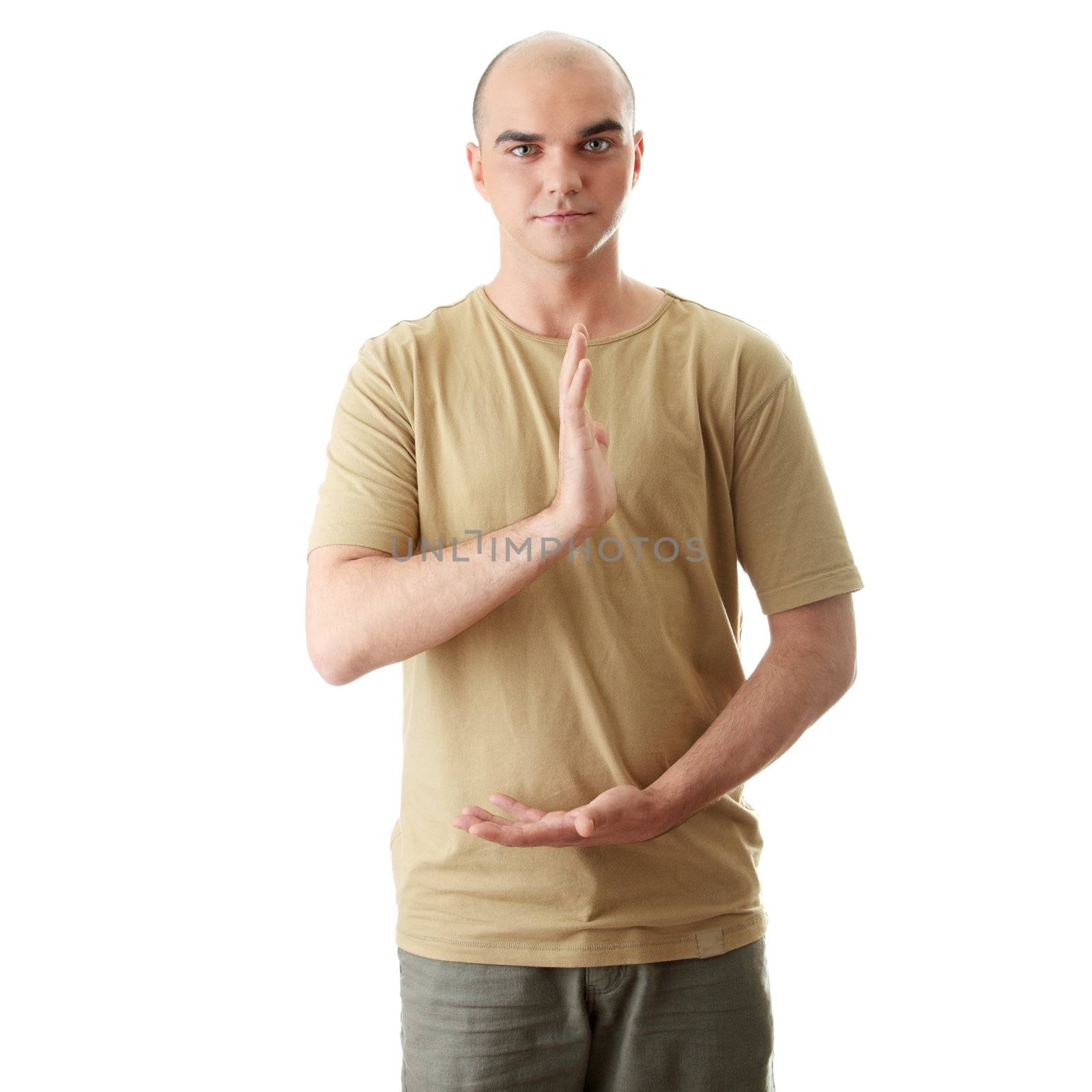 Man is making yoga in casual clothes isolated on white