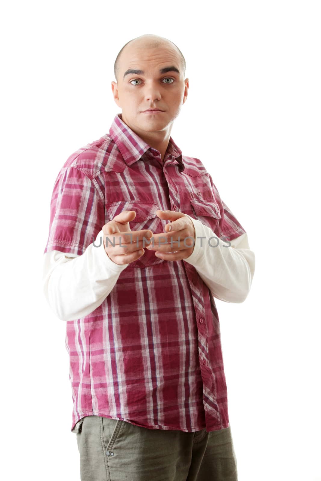 Young caucasian man, pointing at camera. Isolated on white