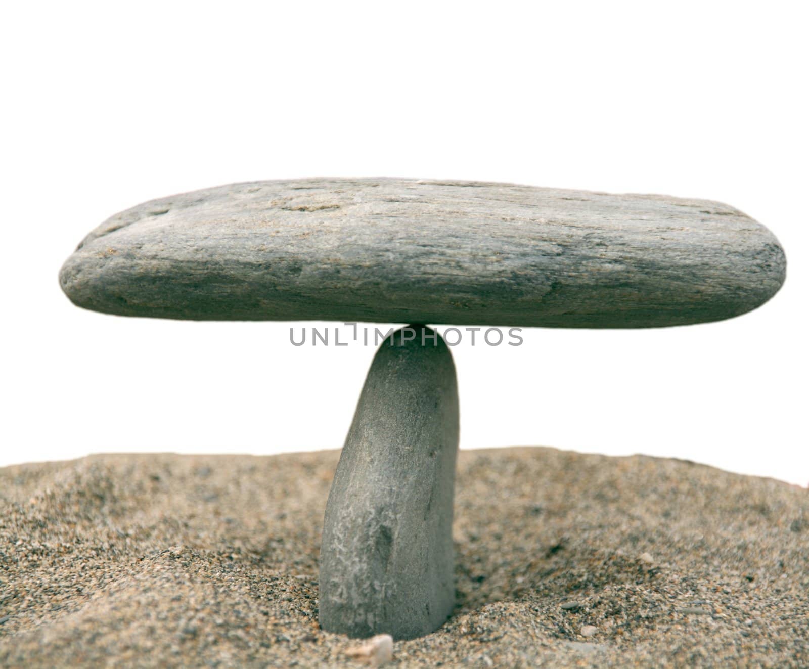 two stones in equilibrium, isolated in white