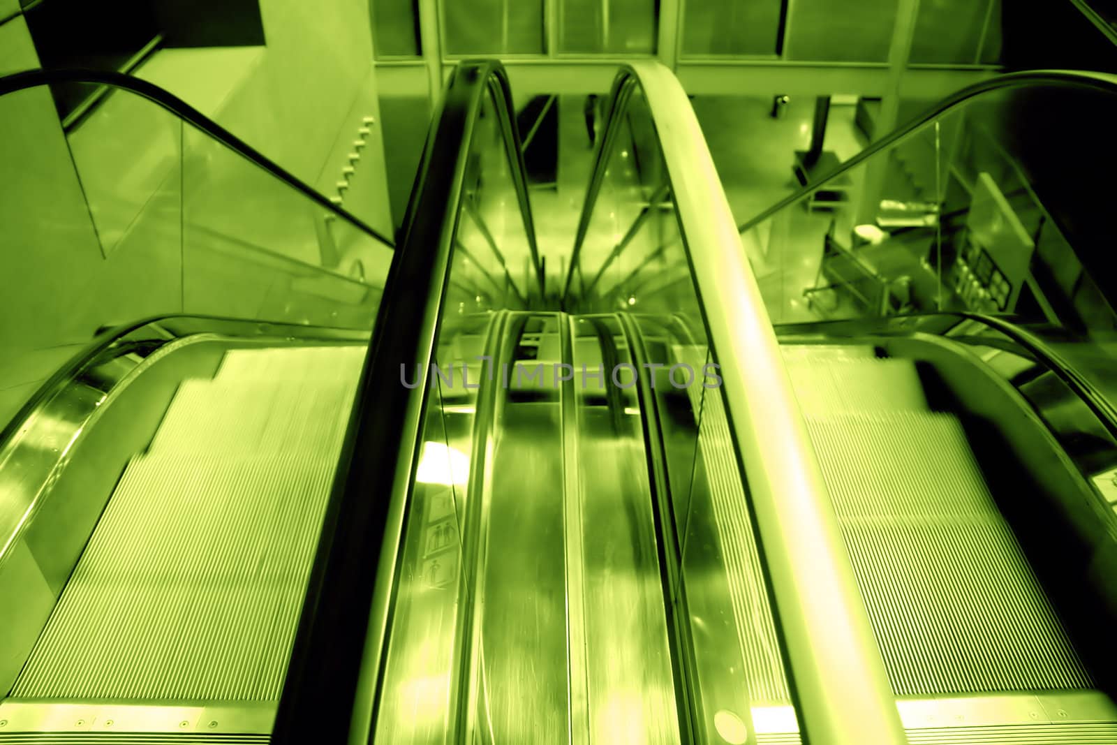 green escalators view in a comercial centre
