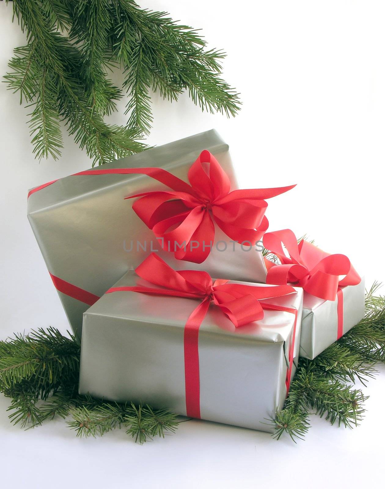Christmas gifts in silver paper