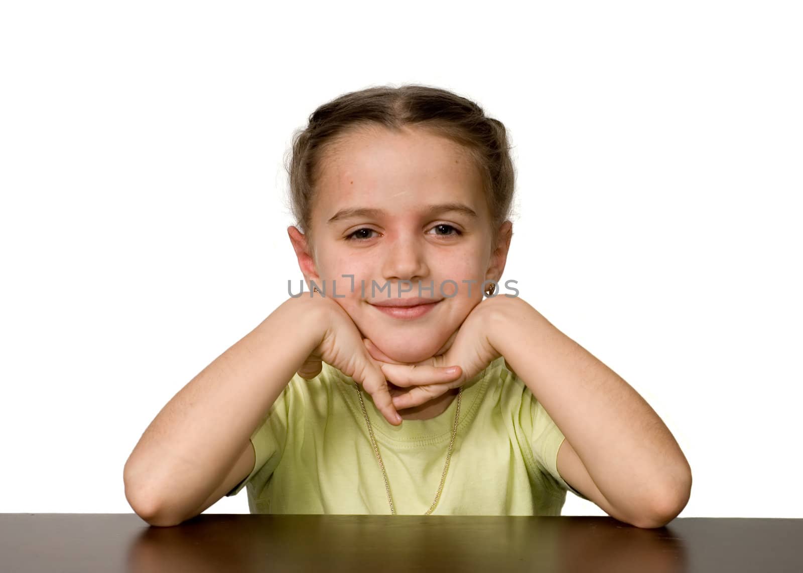 Pretty girl on a table, white background