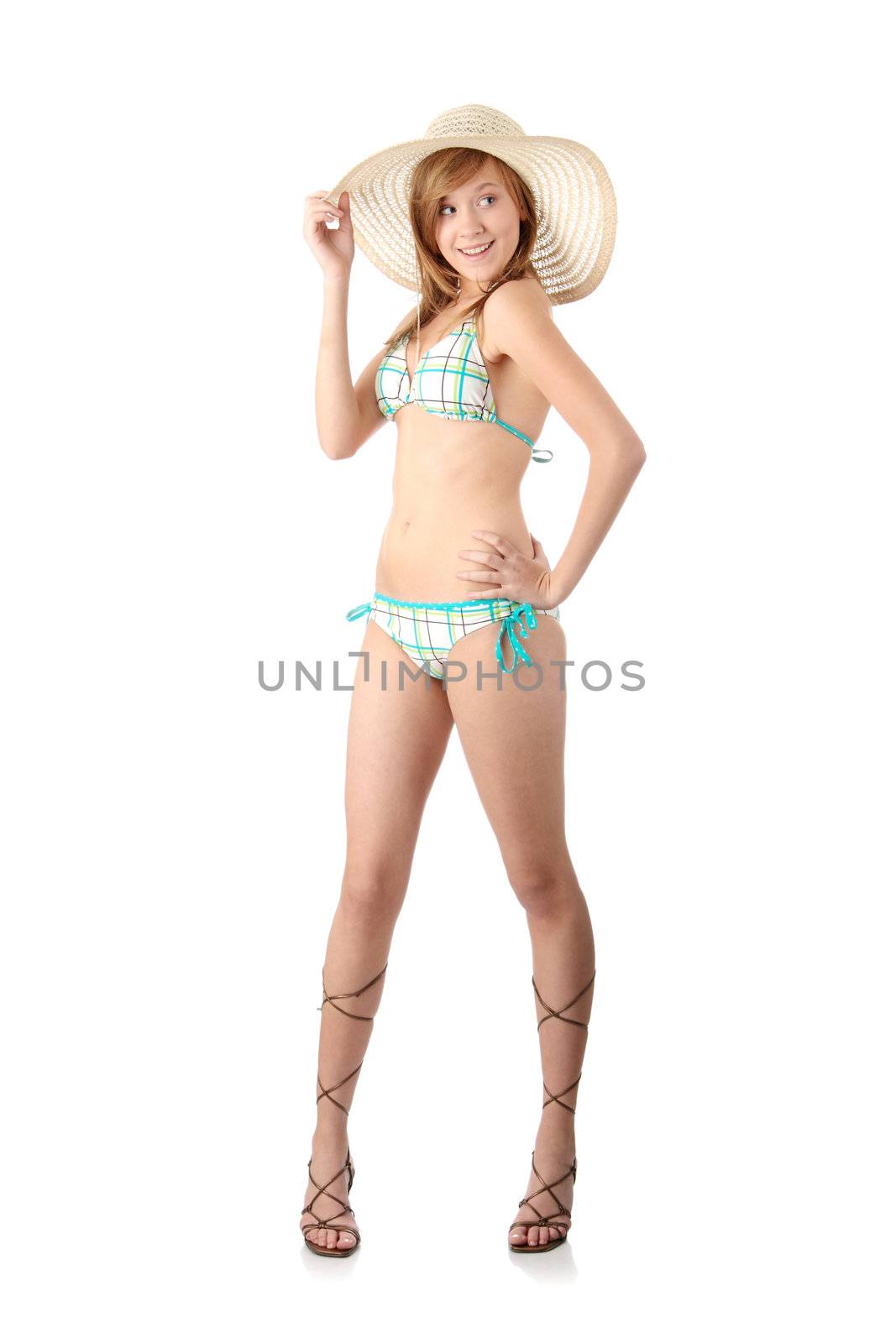 Summer teen girl in swimsuit, isolated on white background