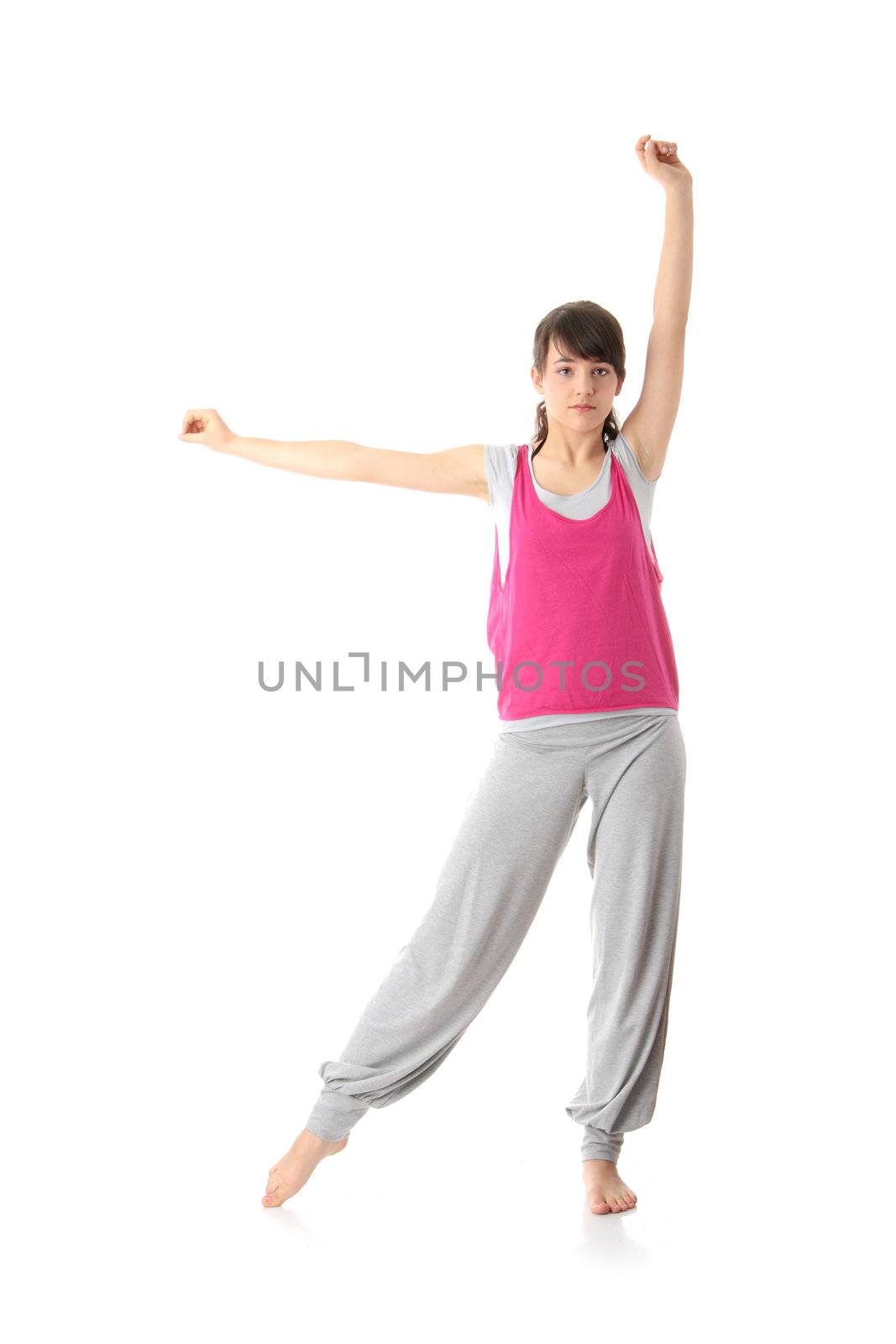 Teen woman training yoga, isolated on white