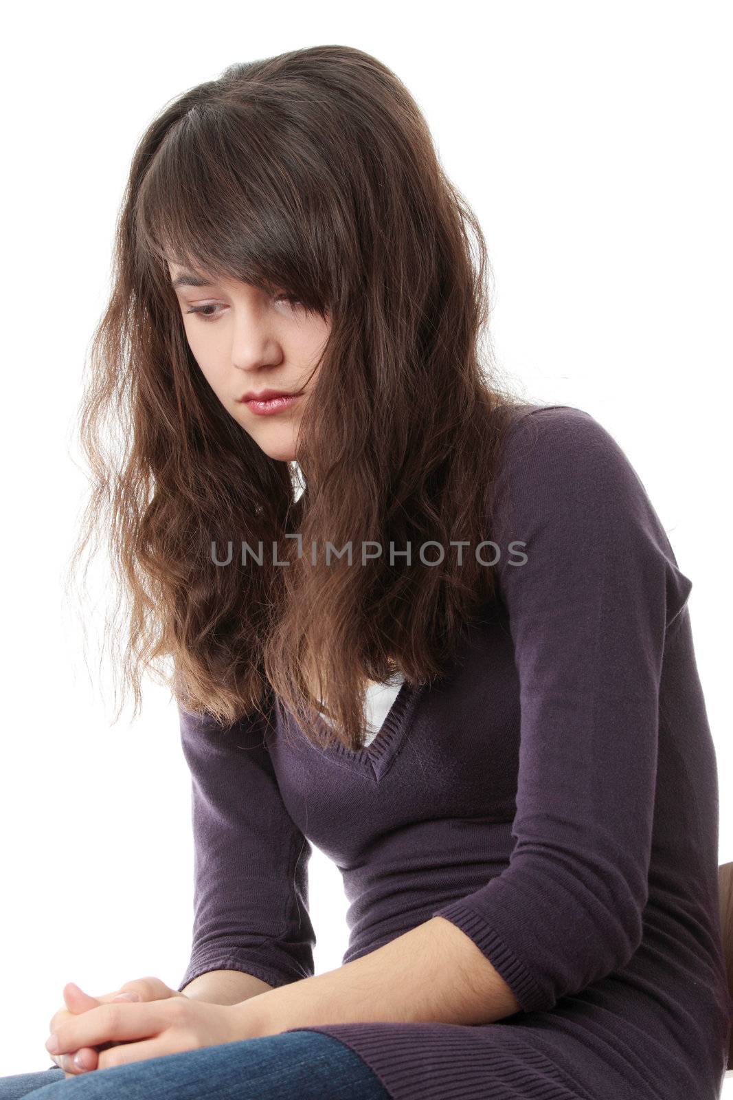 Young teen woman with depression isolated on white