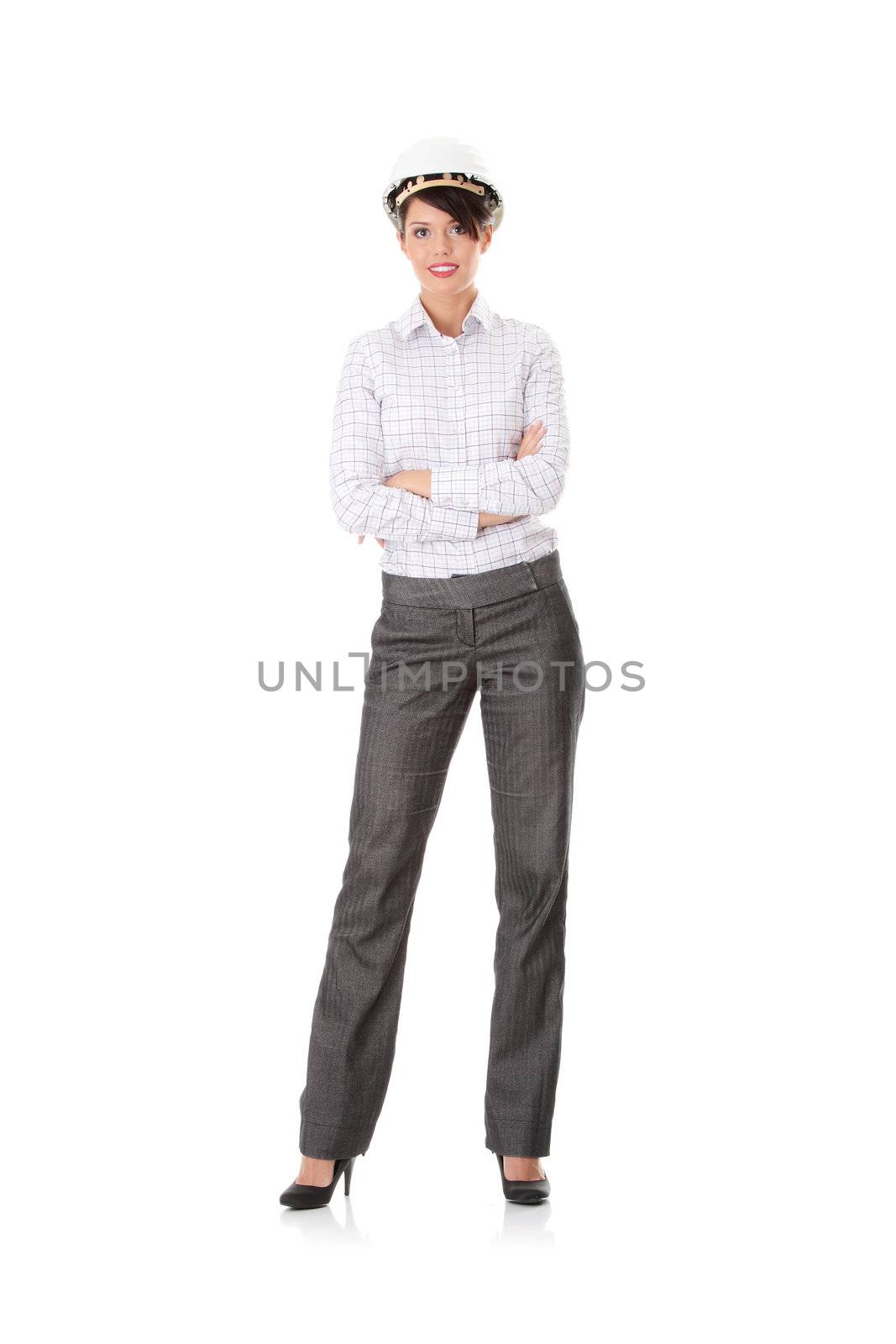 Portrait of confident female worker in helmet
