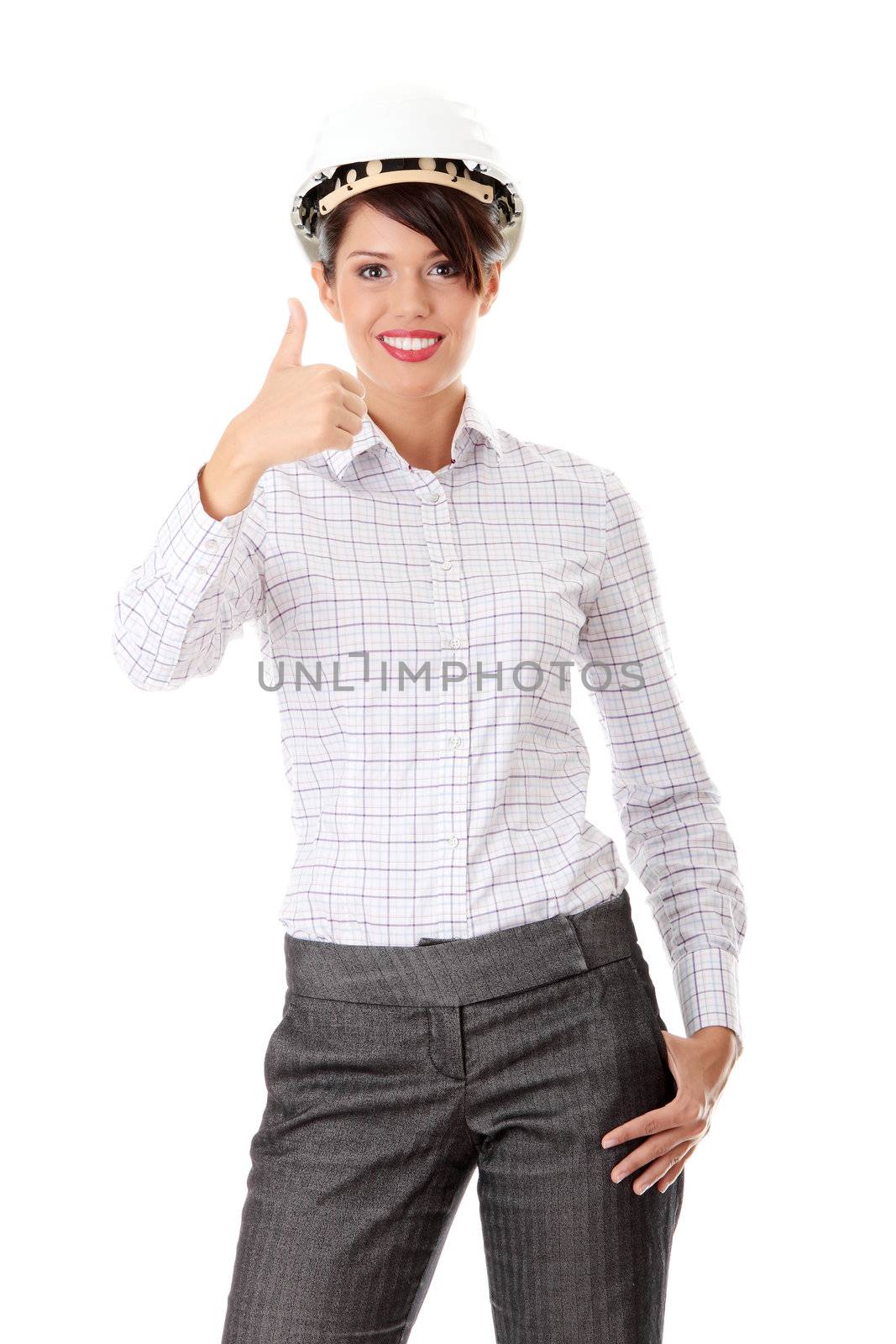 Portrait of confident female worker in helmet