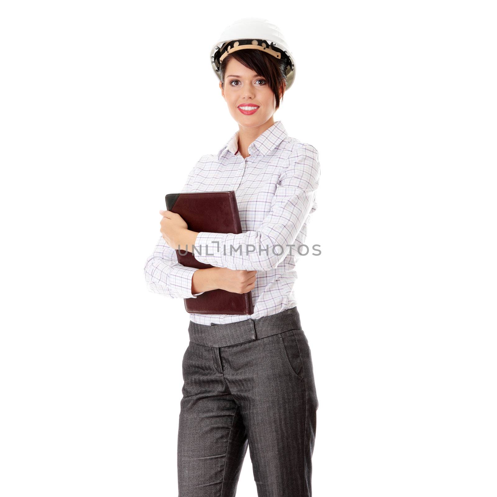 Portrait of confident female worker in helmet