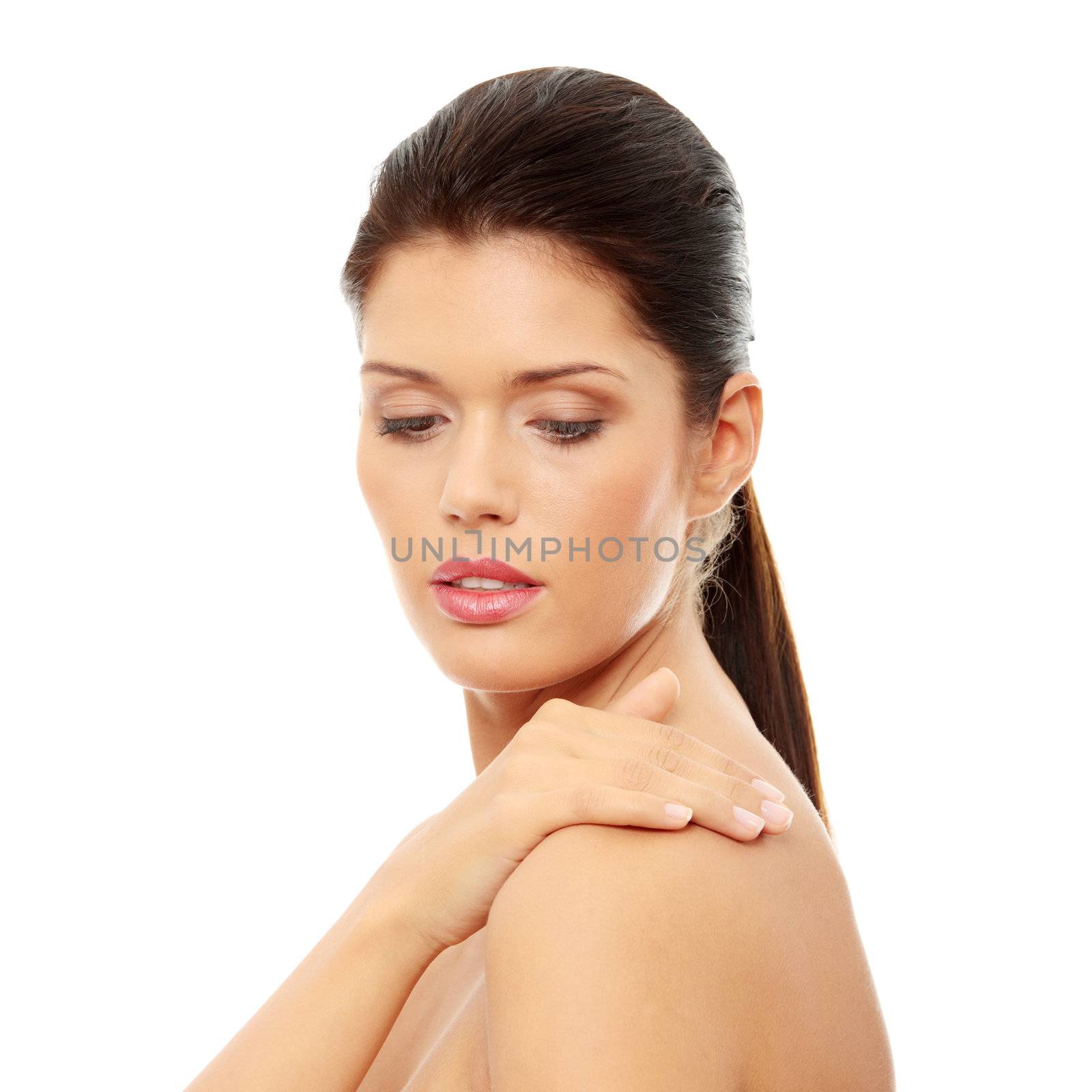 Beautiful woman's face with fresh clean skin isolated on white