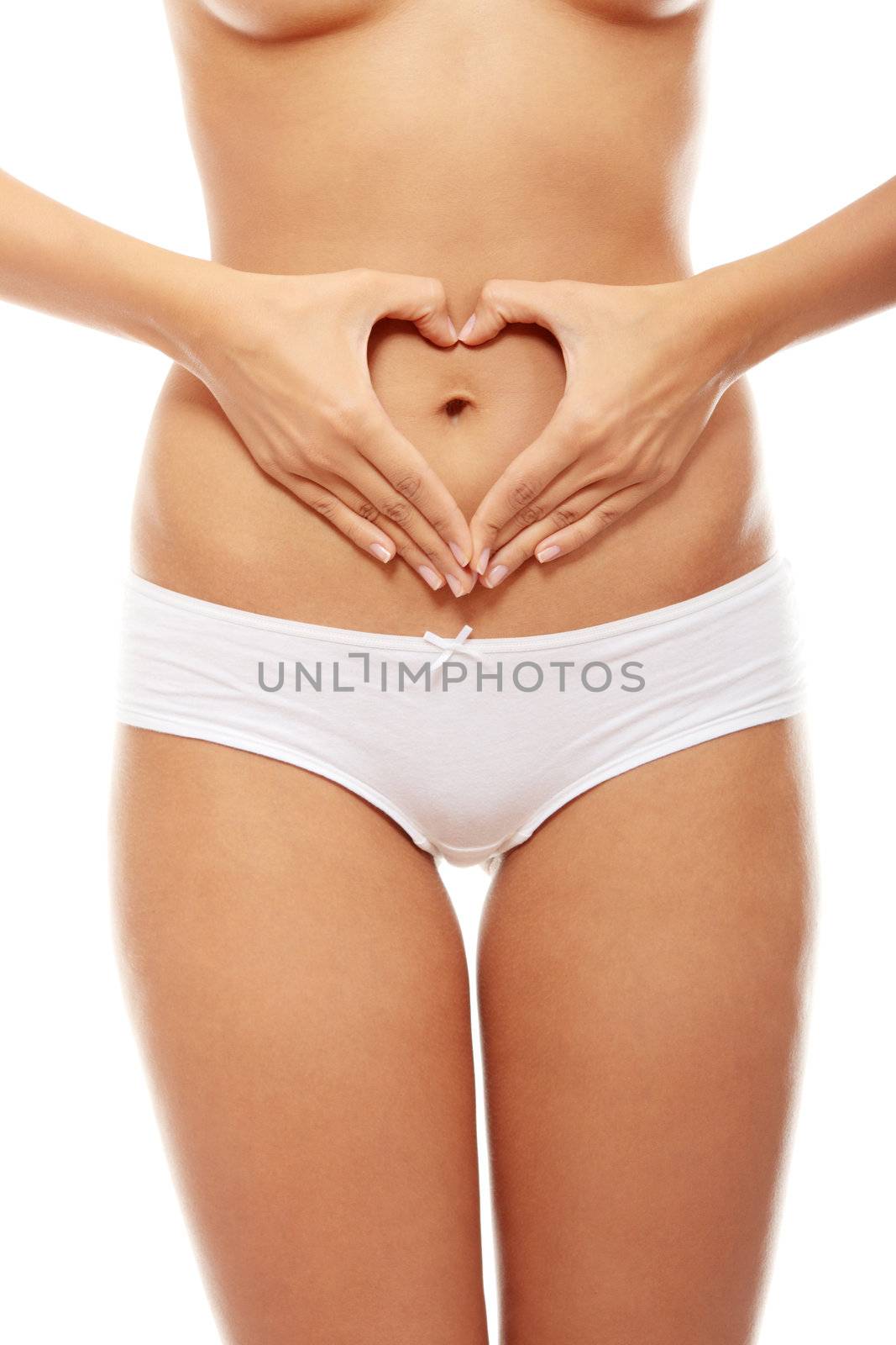Beautiful female body isolated on white. Sexy young woman in white panties