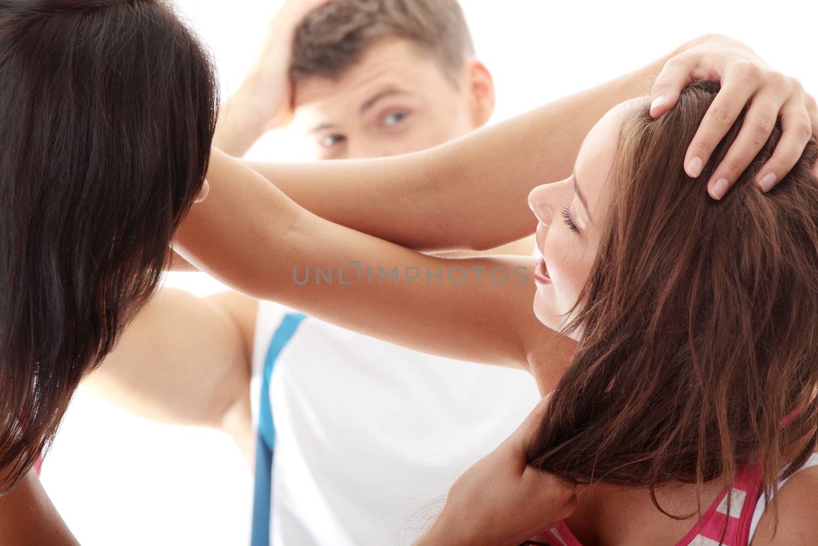 Jealous woman fight for a guy. Isolated on white