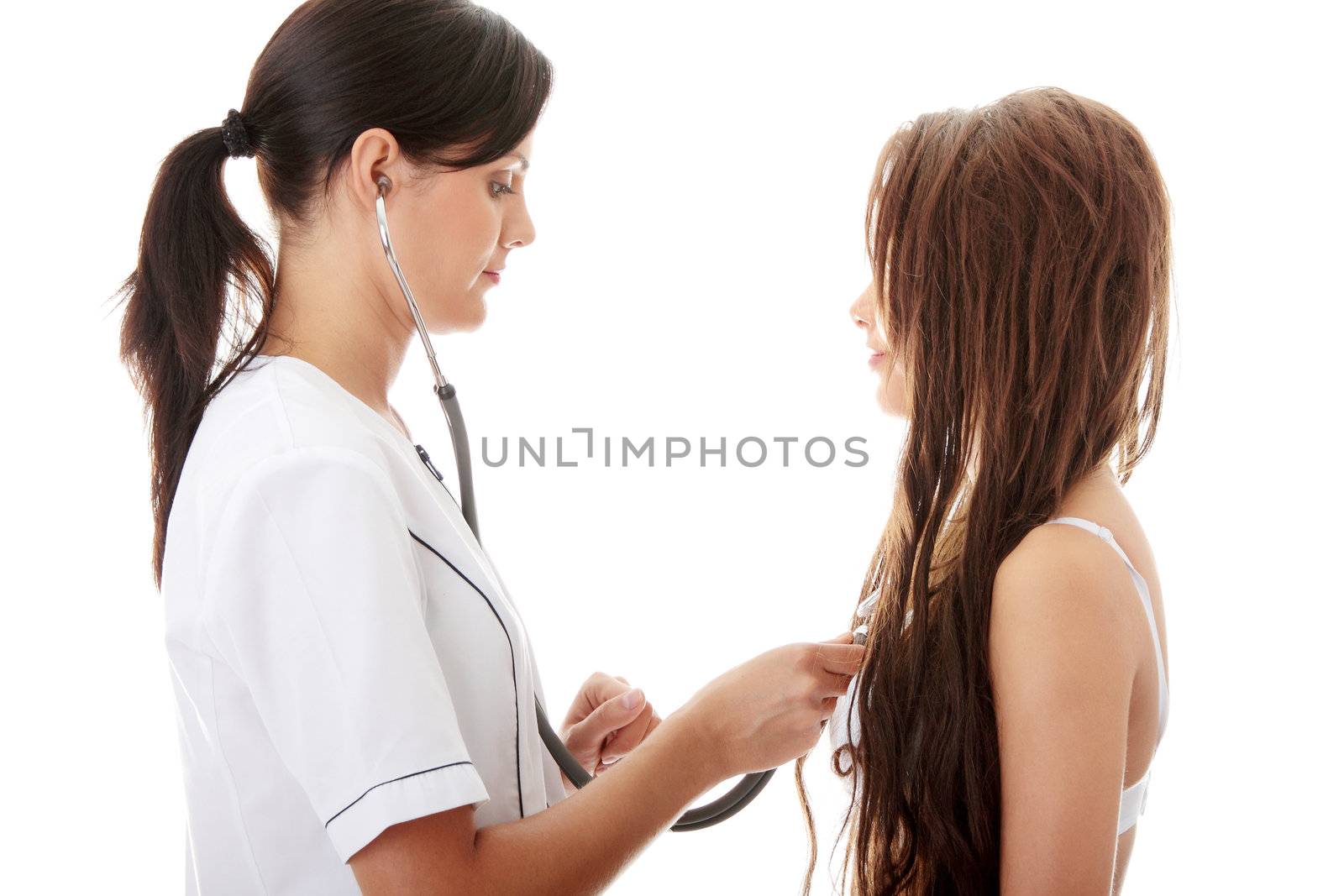 Young female doctor with female patient.