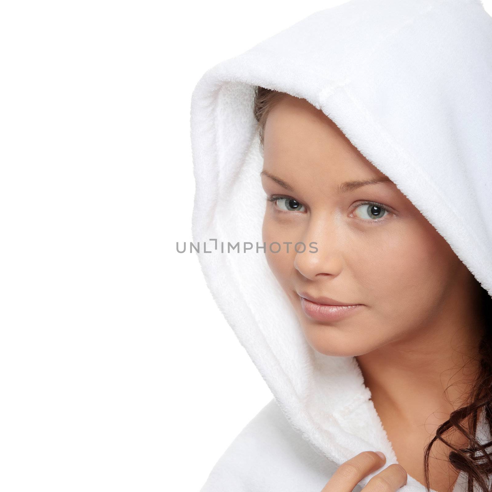 Beautiful young caucasian woman in bathrobe after bath calm portrait. Isolated