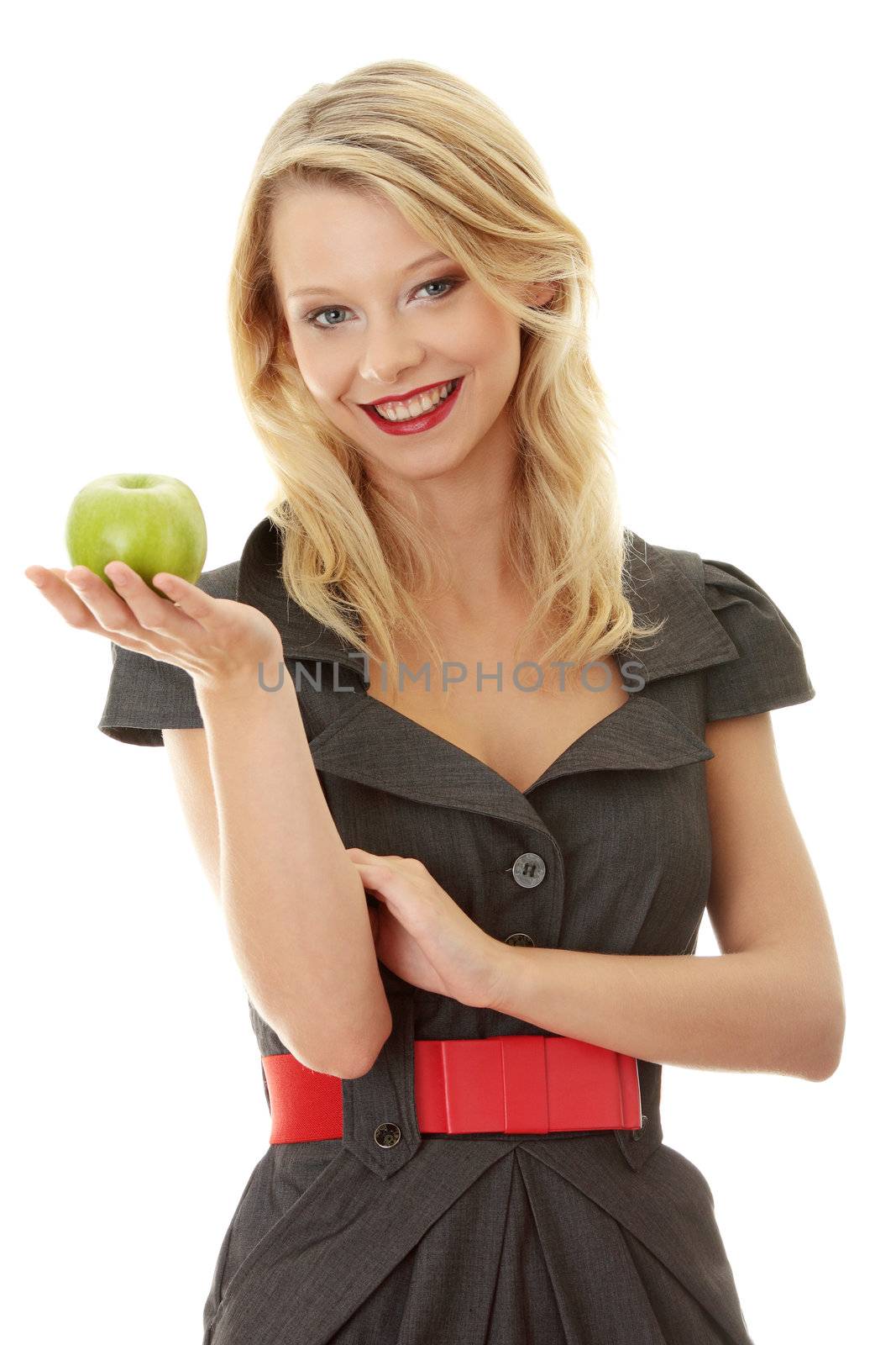 Young blond woman with green apple on her hand - healthy eating concept