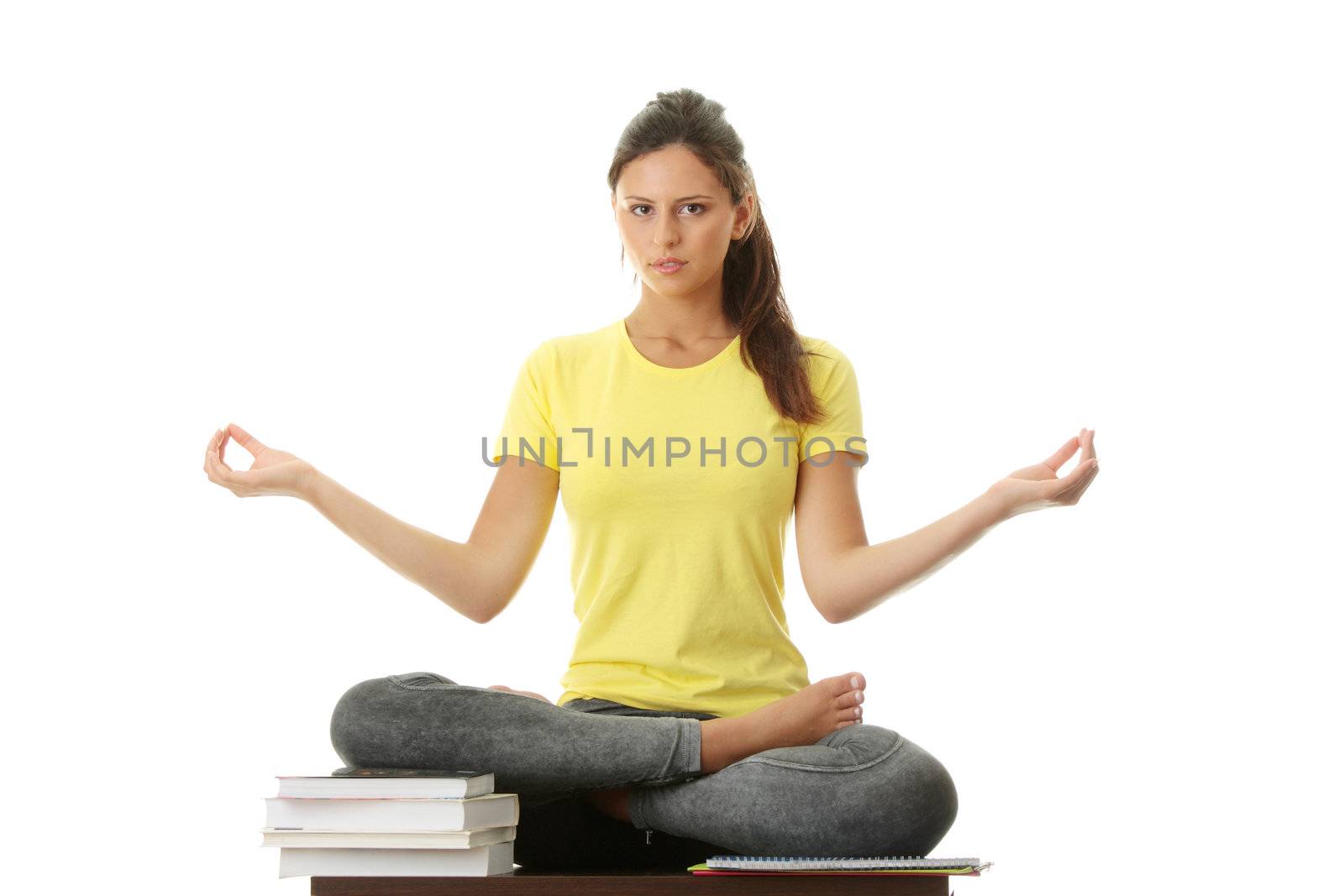 Student gir meditating by BDS