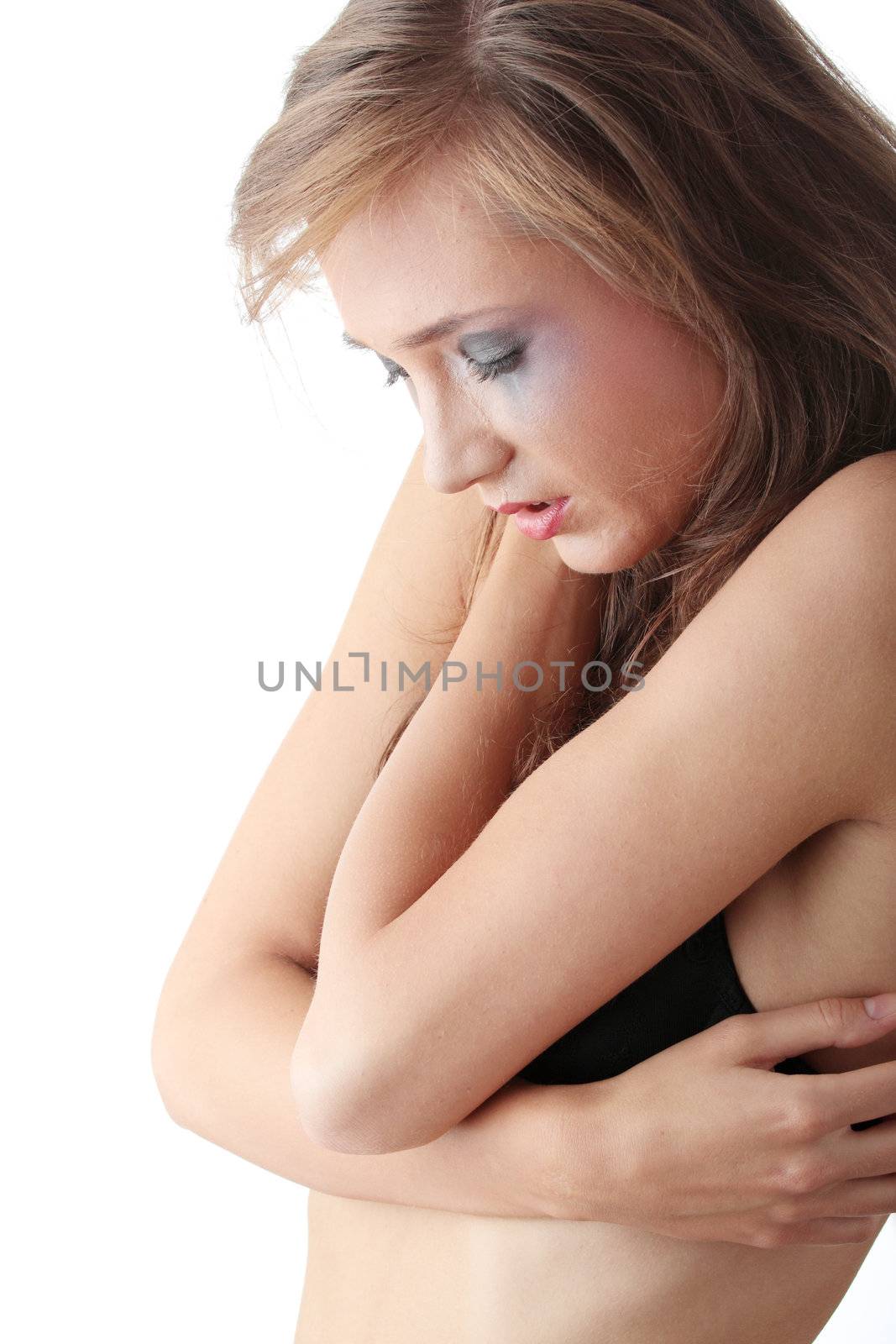 Emotional portrait of abused, crying, beautiful, young ,caucasian woman in underwear - violence concept