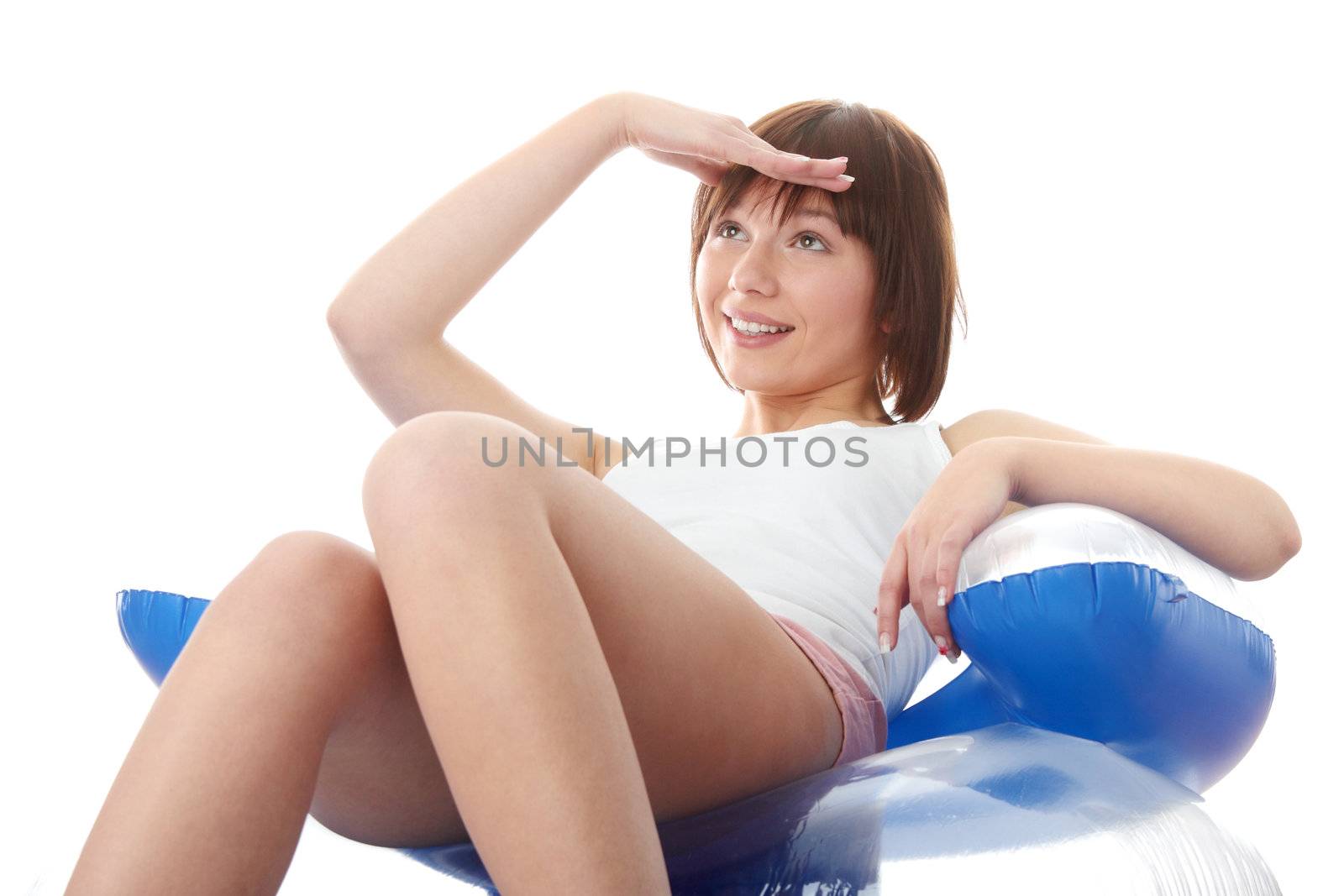 Summer girl sitting on air seat, isolated on white