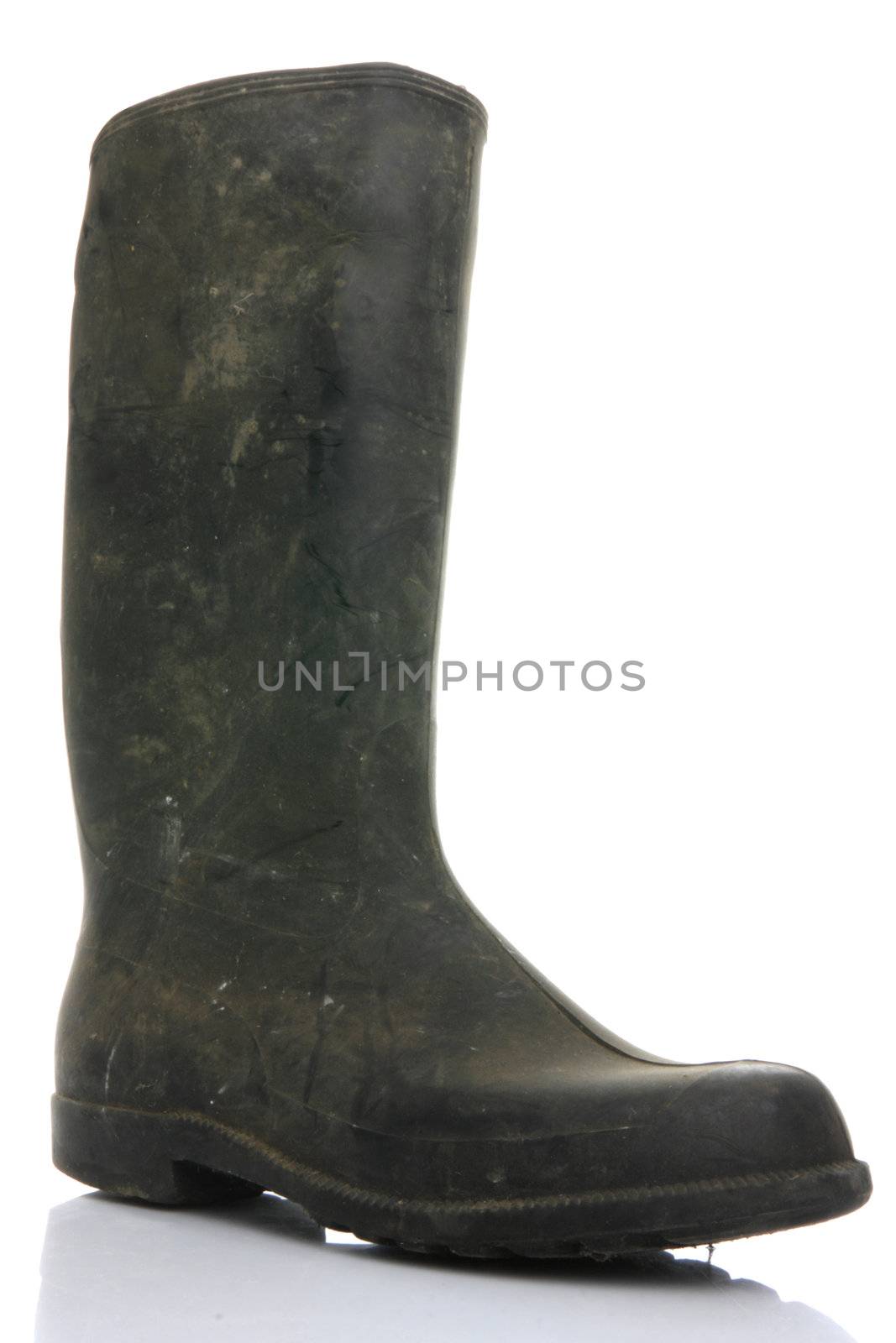 Rubber dirty boot isolated on white