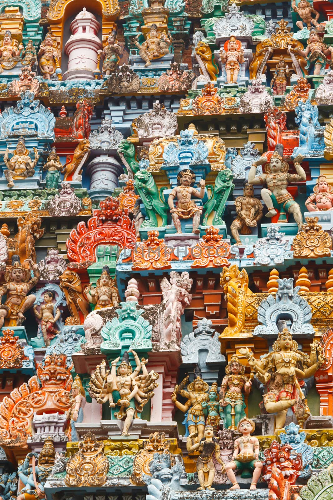 Sculptures on Hindu temple gopura (tower). Jambukeshwarar temple. Madurai, Tamil Nadu, India