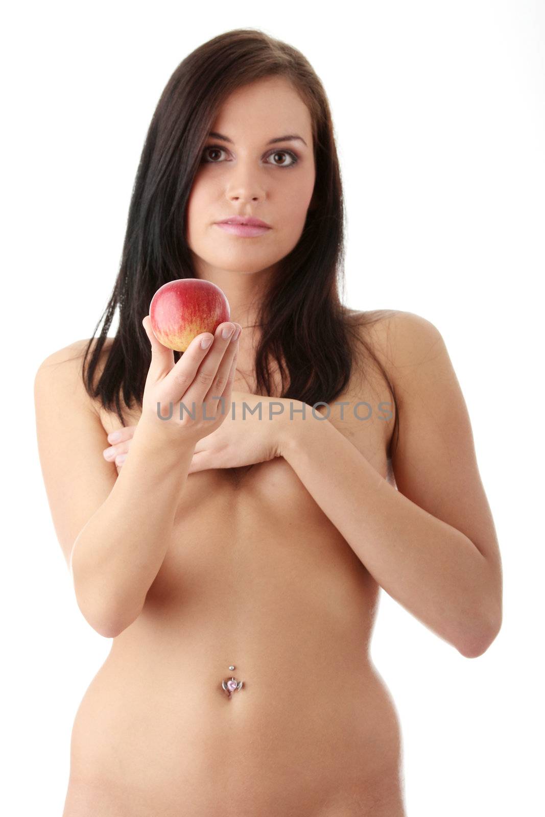 Nude young woman with a red juicy apple, isolated on white background - focused on apple