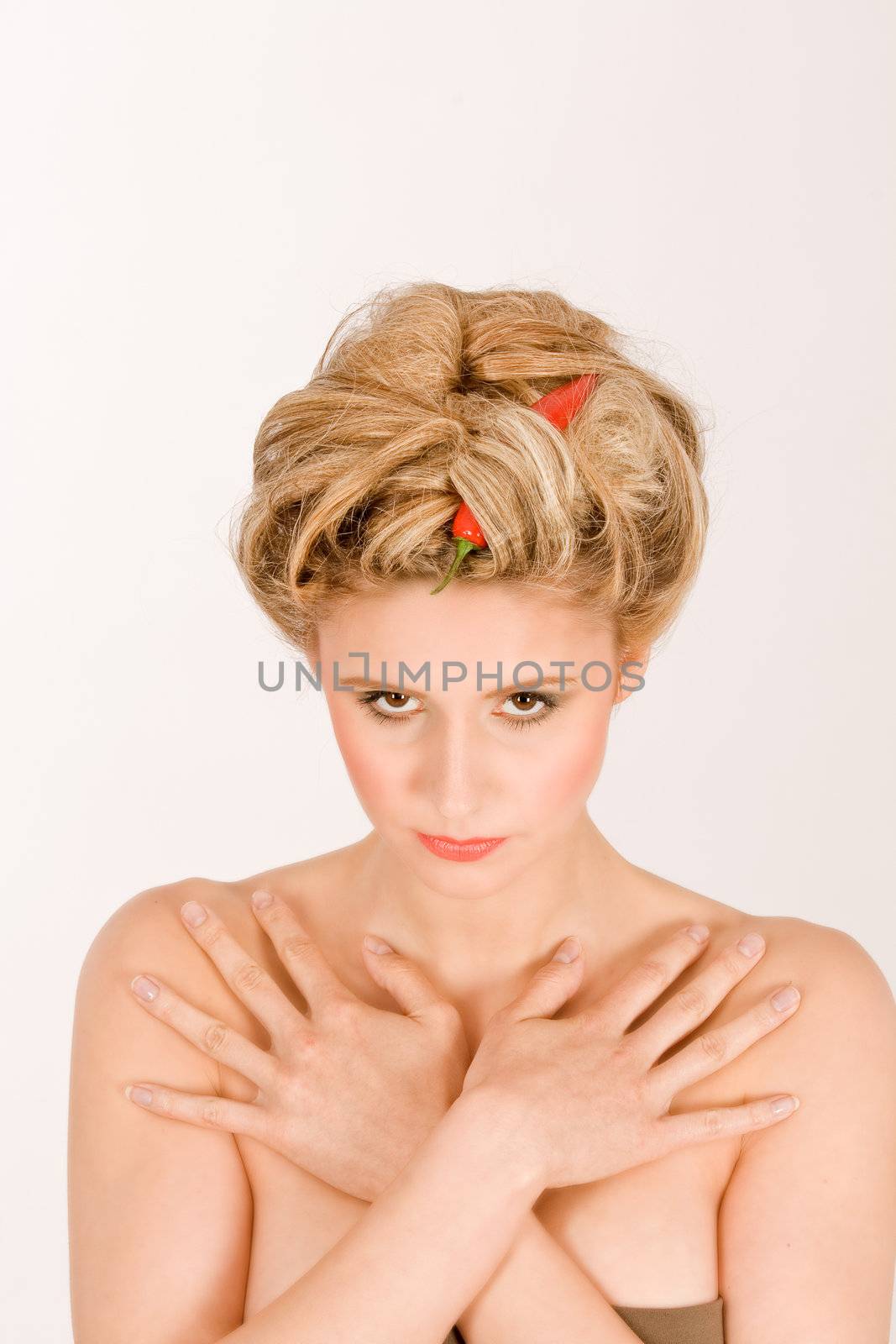 Portrait of a woman with vegetables in your hair