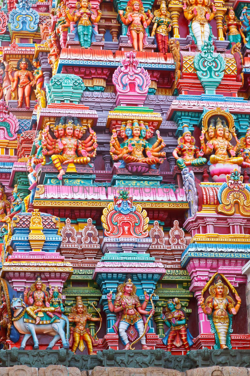 Sculptures on Hindu temple gopura (tower). Menakshi Temple, Madurai, Tamil Nadu, India
