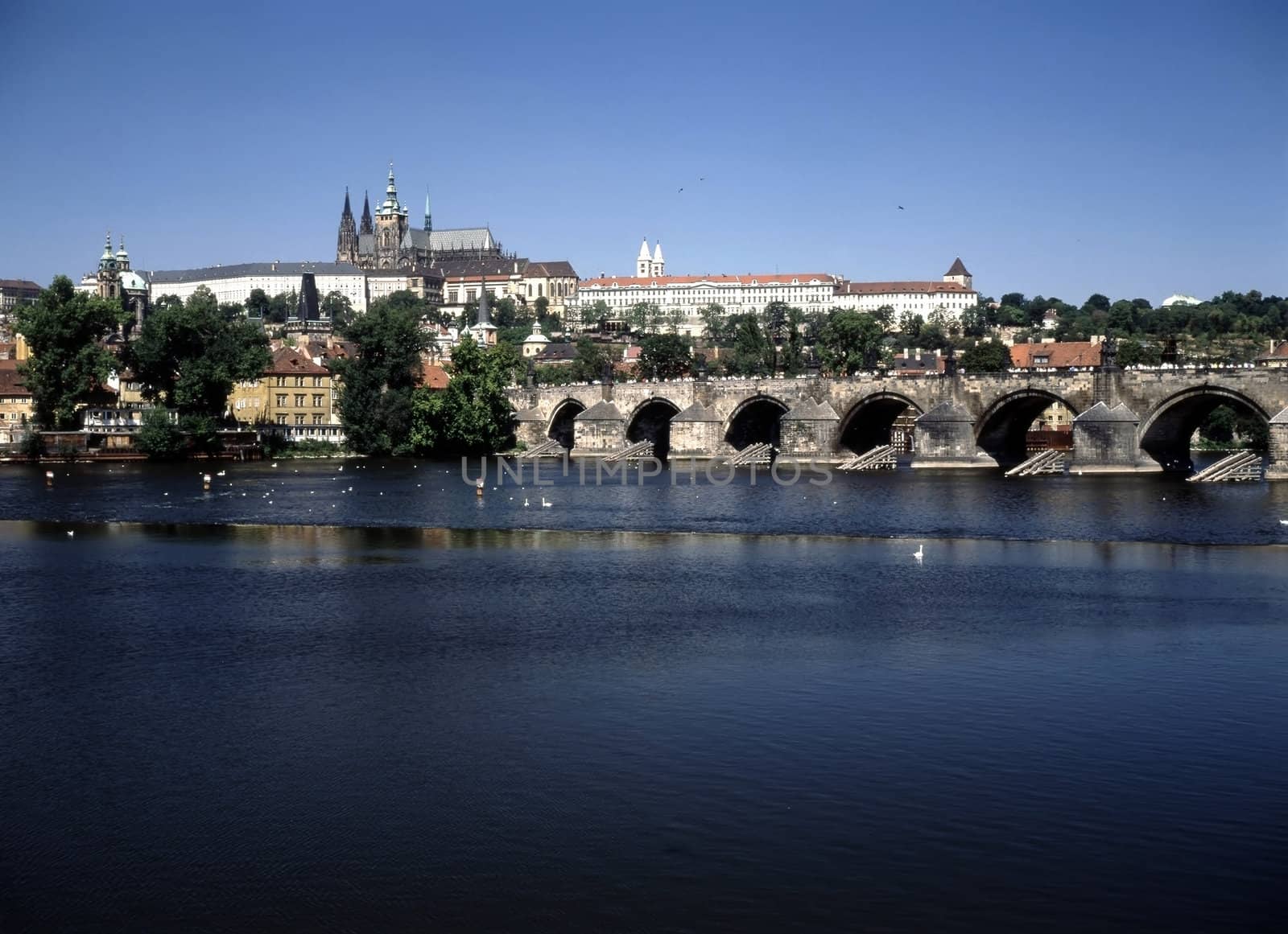 View of river Vltava and Prague Castle with Charles Bridge in Prague, Czech Republic