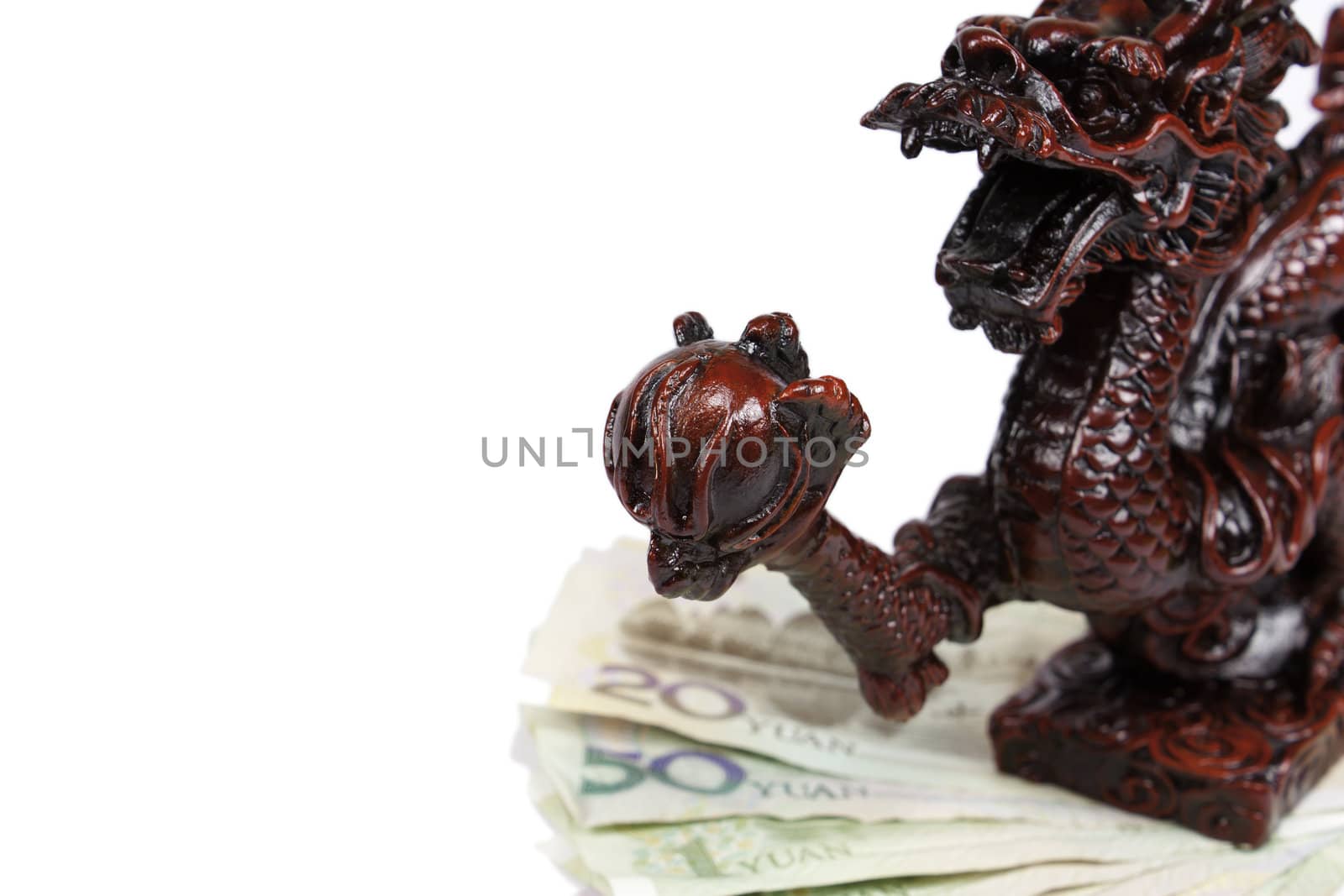 Picture of a dragon watching over money