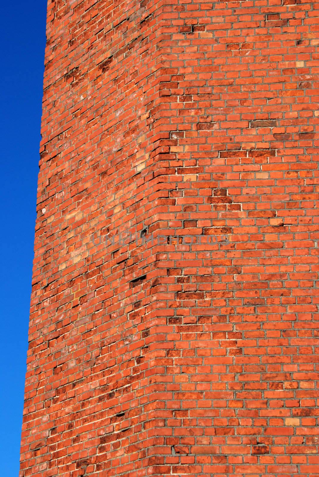 Red brick wall by sauletas