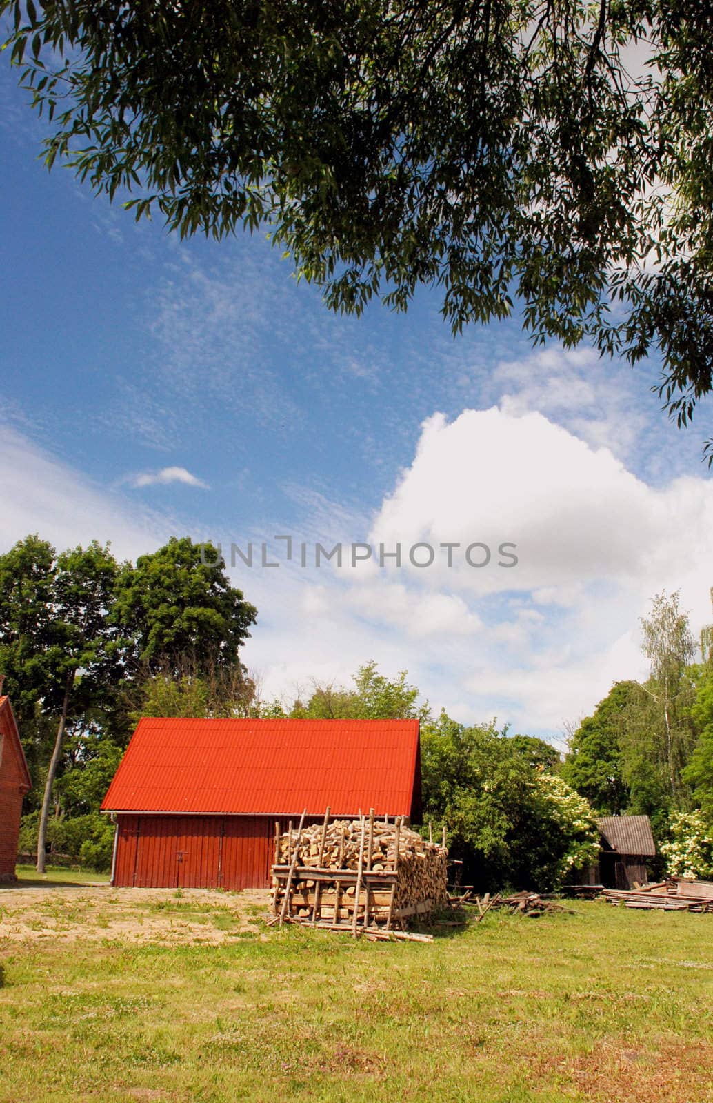 Red building in village by sauletas