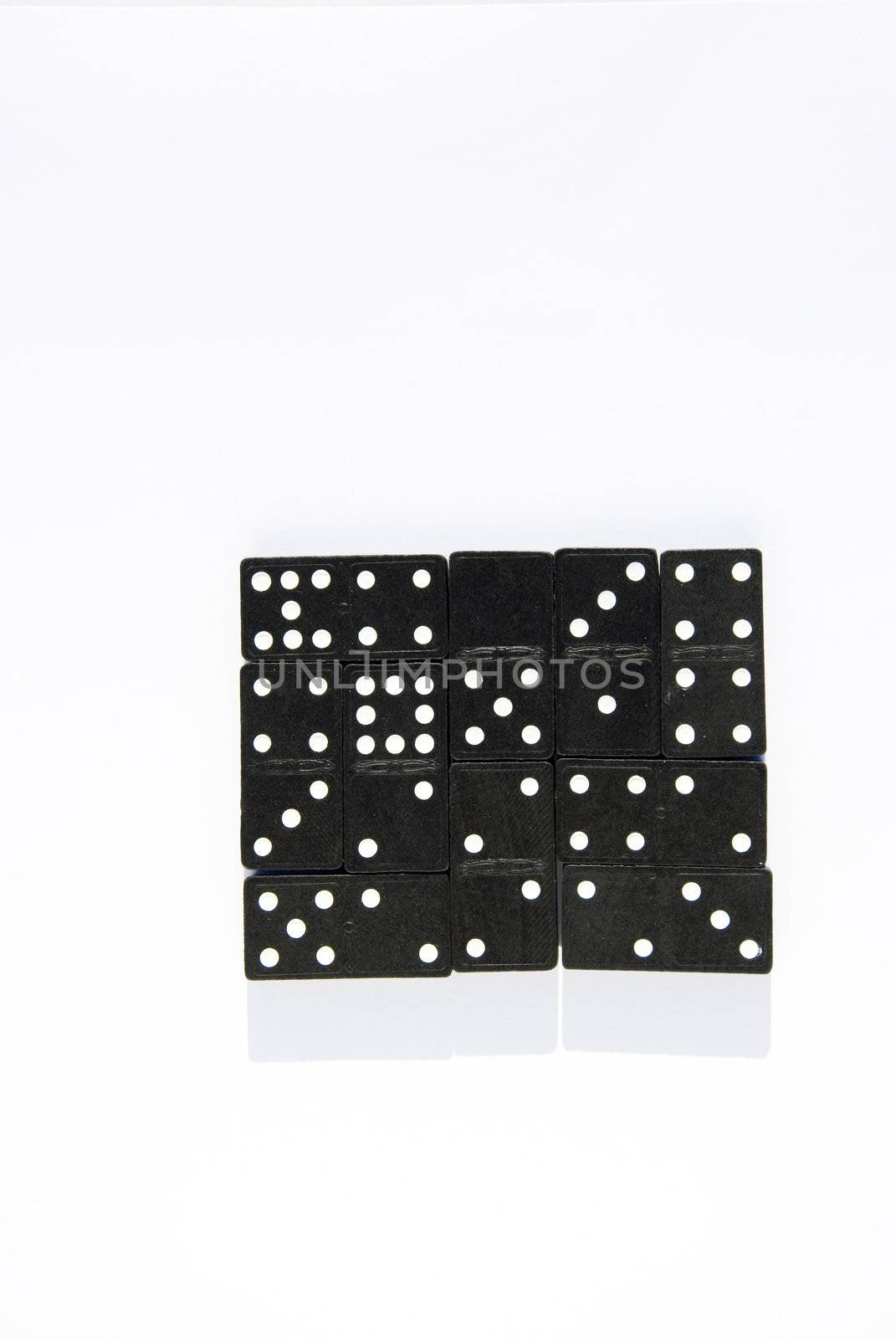 Black domino square blocks in a white background