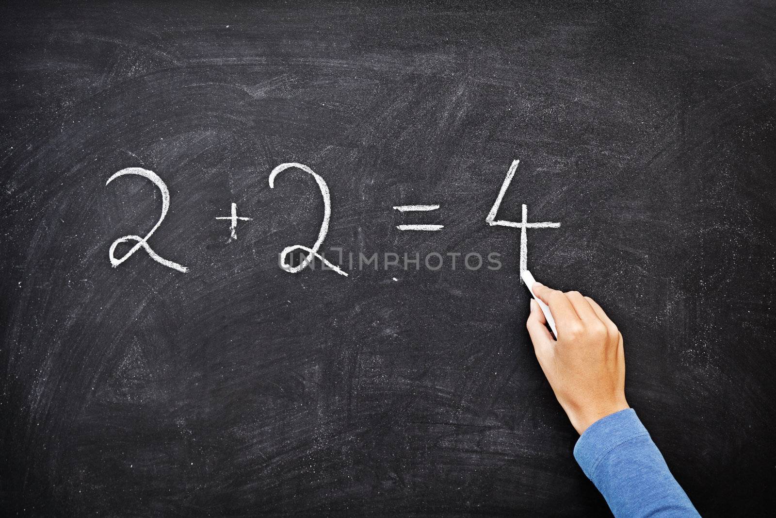 Math chalkboard / blackboard. Hand writing simple mathematical equation. Nice texture.