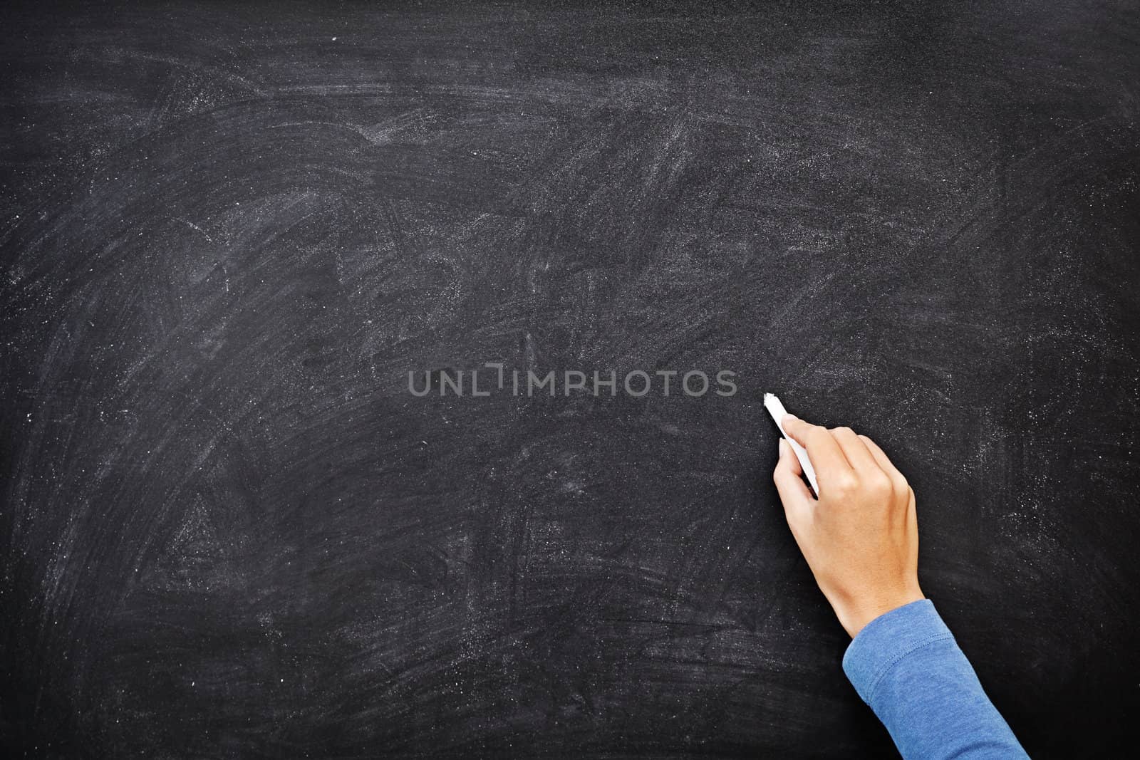 Hand writing on chalkboard / blackboard by Maridav