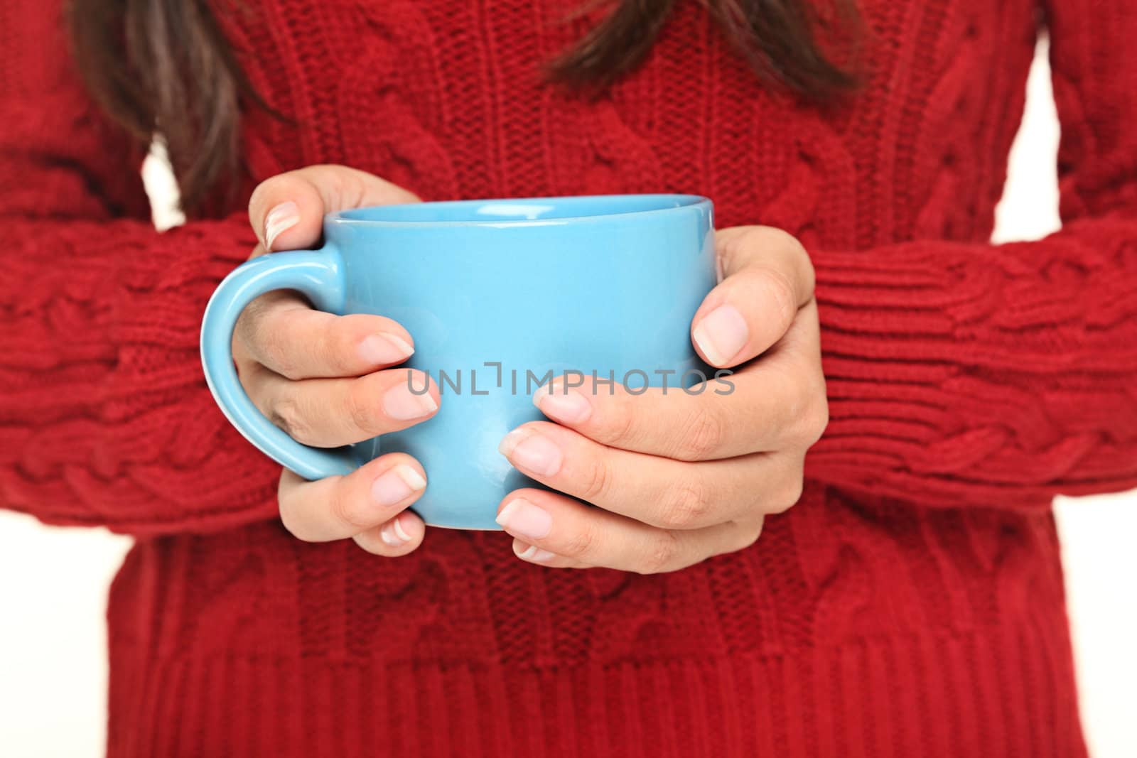 Tea. Woman holding tea cup.