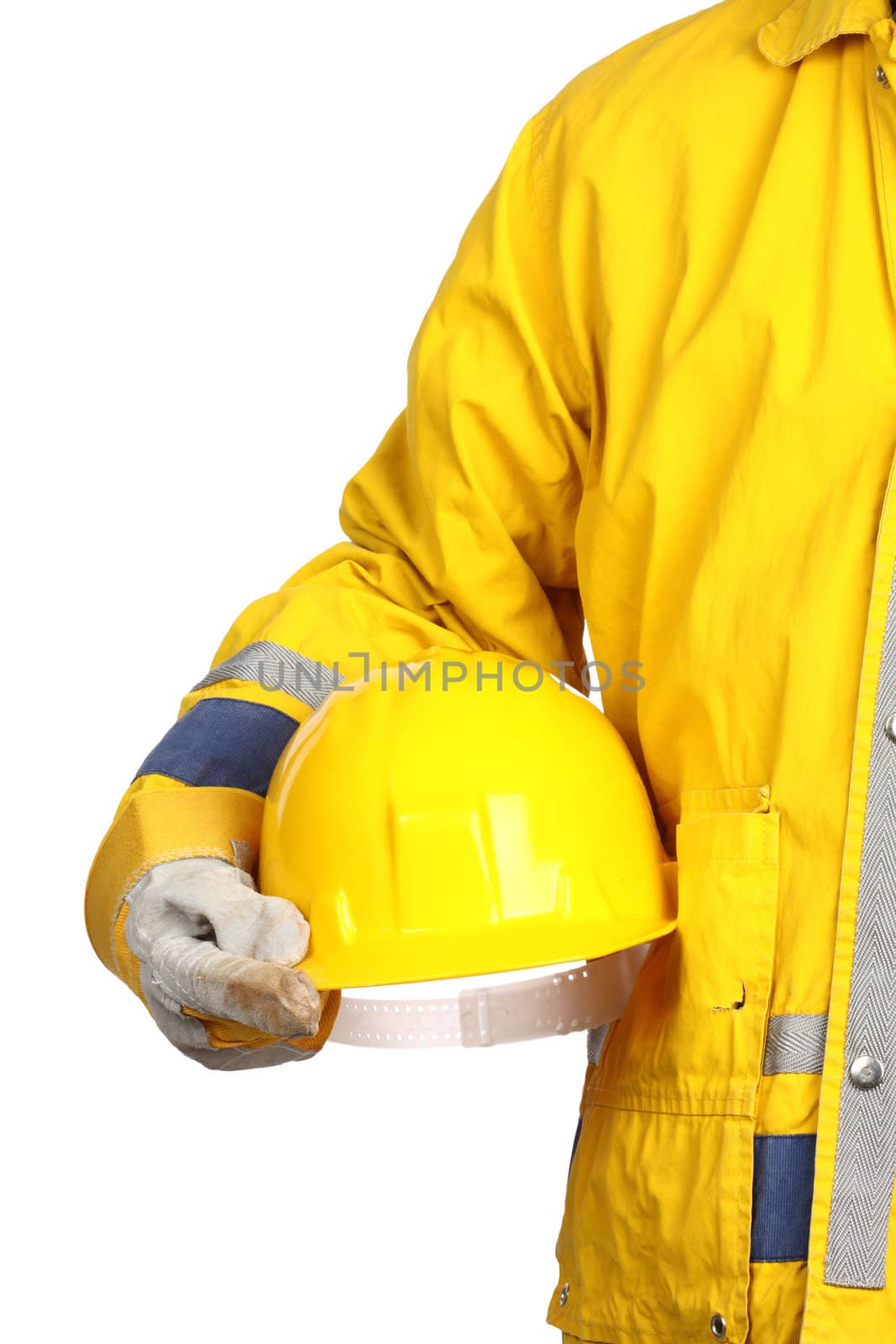 man holding yellow helmet over white 