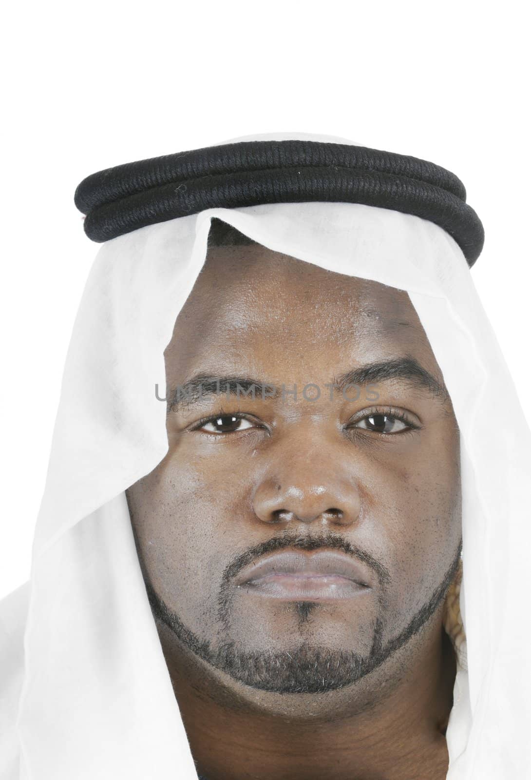 young middle-eastern man with beard, in Arabian headress, isolated on white background