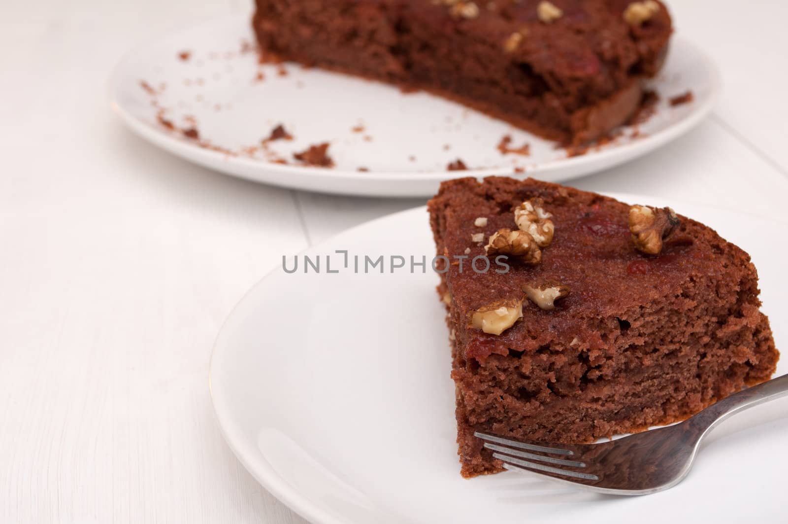 Homemade Gingerbread Cake With Jam and Walnuts on Plate