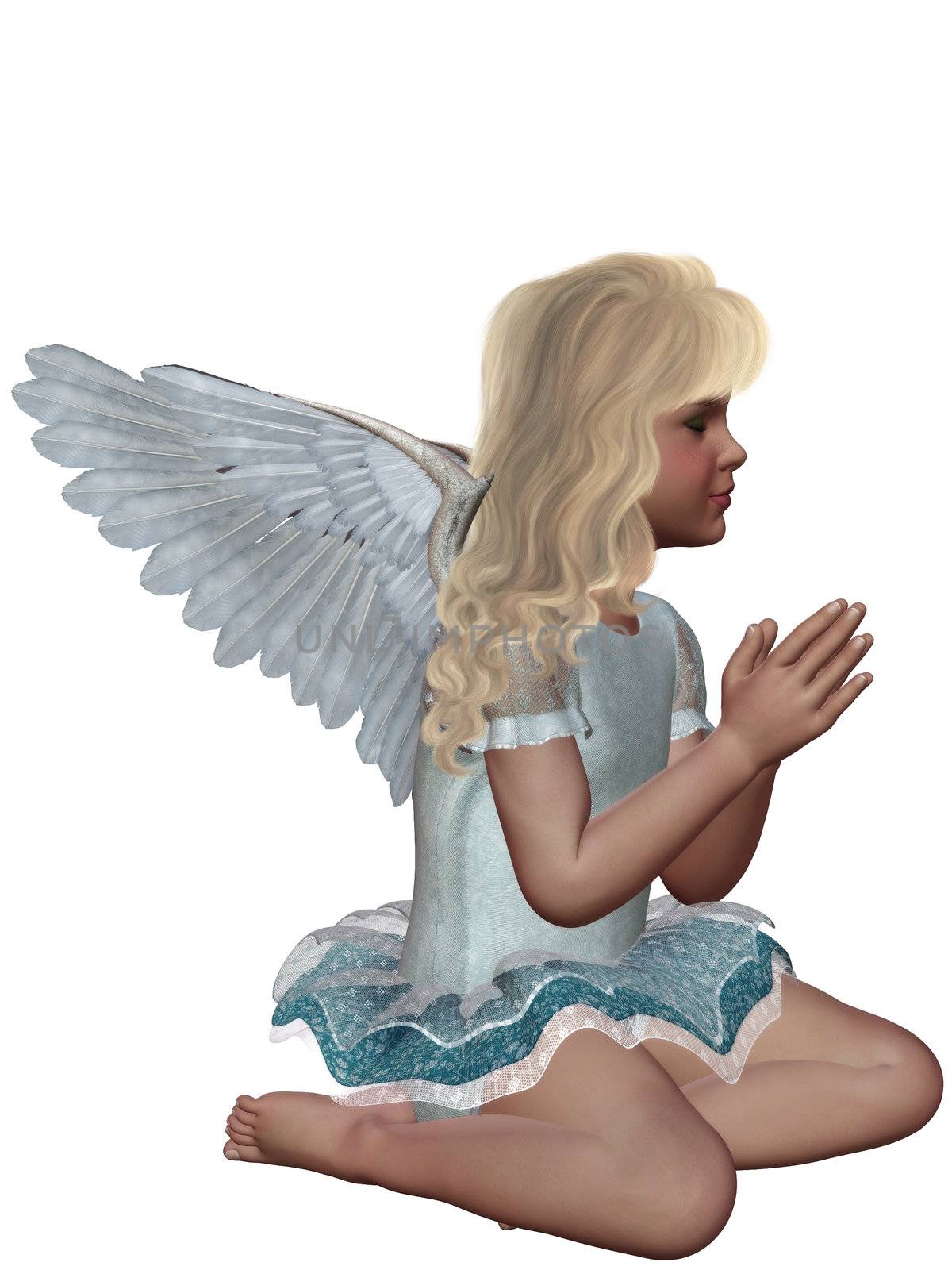 A little angel kneels and prays - isolated on white