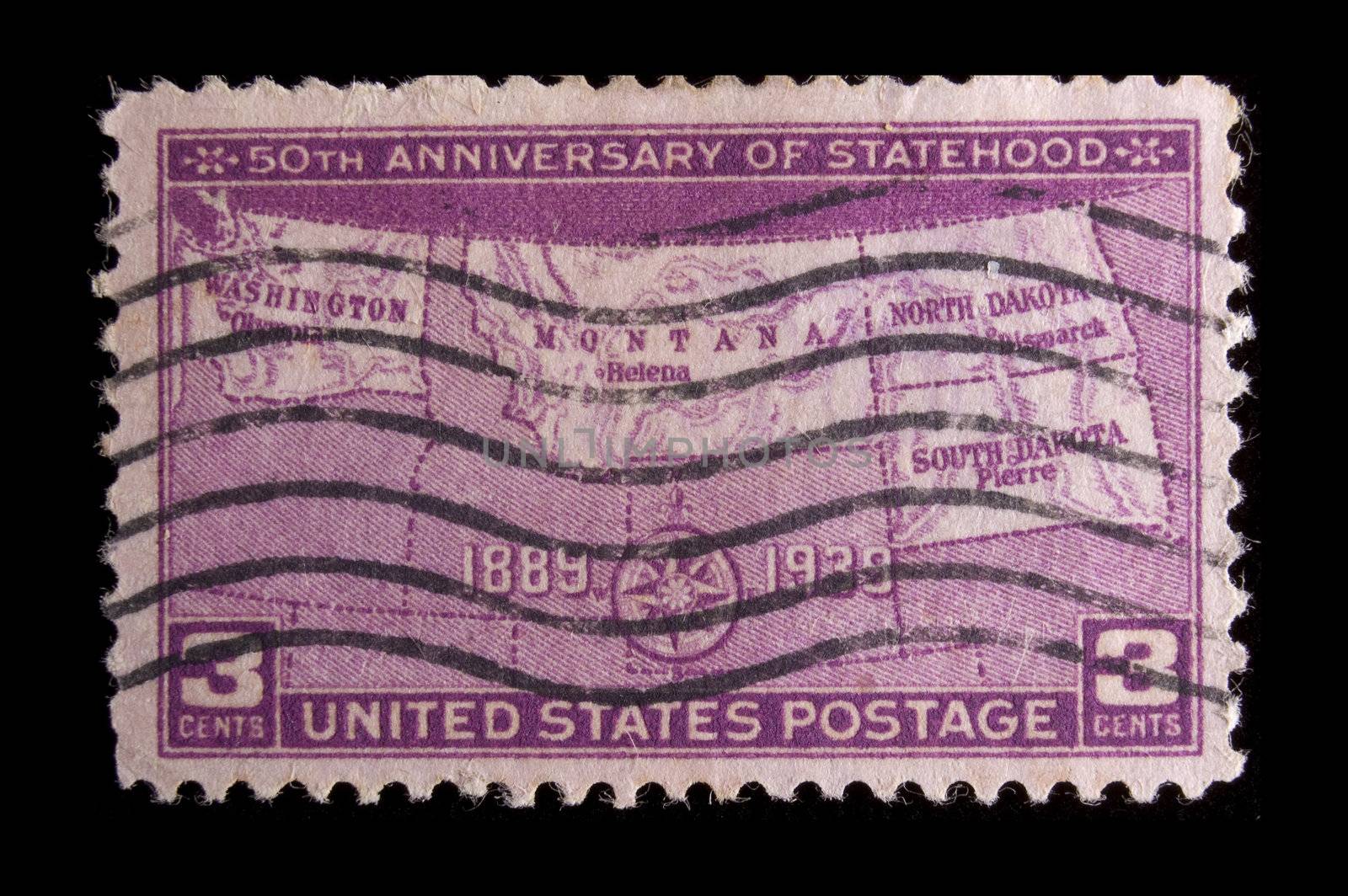 UNITED STATES- CIRCA 1939: Depicting Map of states, with inscription "50th Anniversary of Statehood" and "1889-1939", color magenta, face value 3 cents, circa 1939