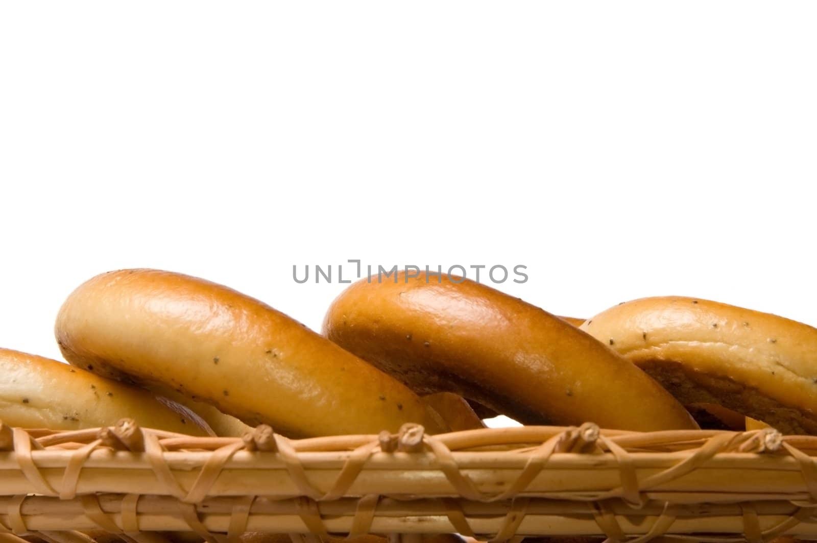 Bagels on wicker plate by Ravenestling