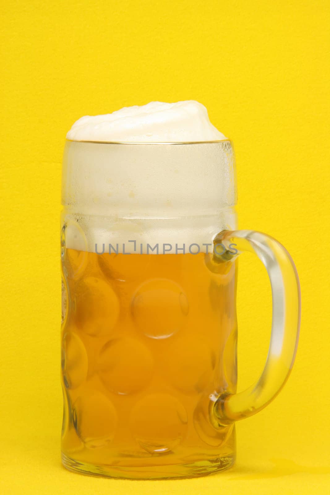 classic bavarian beer mug  in yellow background