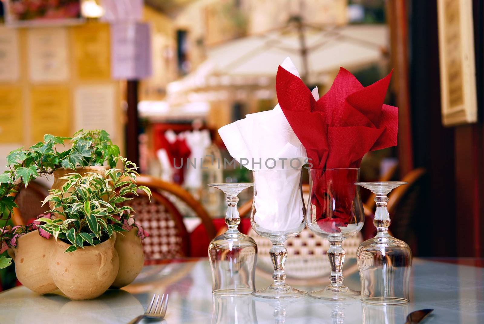 Outdoor restaurant patio on the street of Sarlat, Dordogne region, France